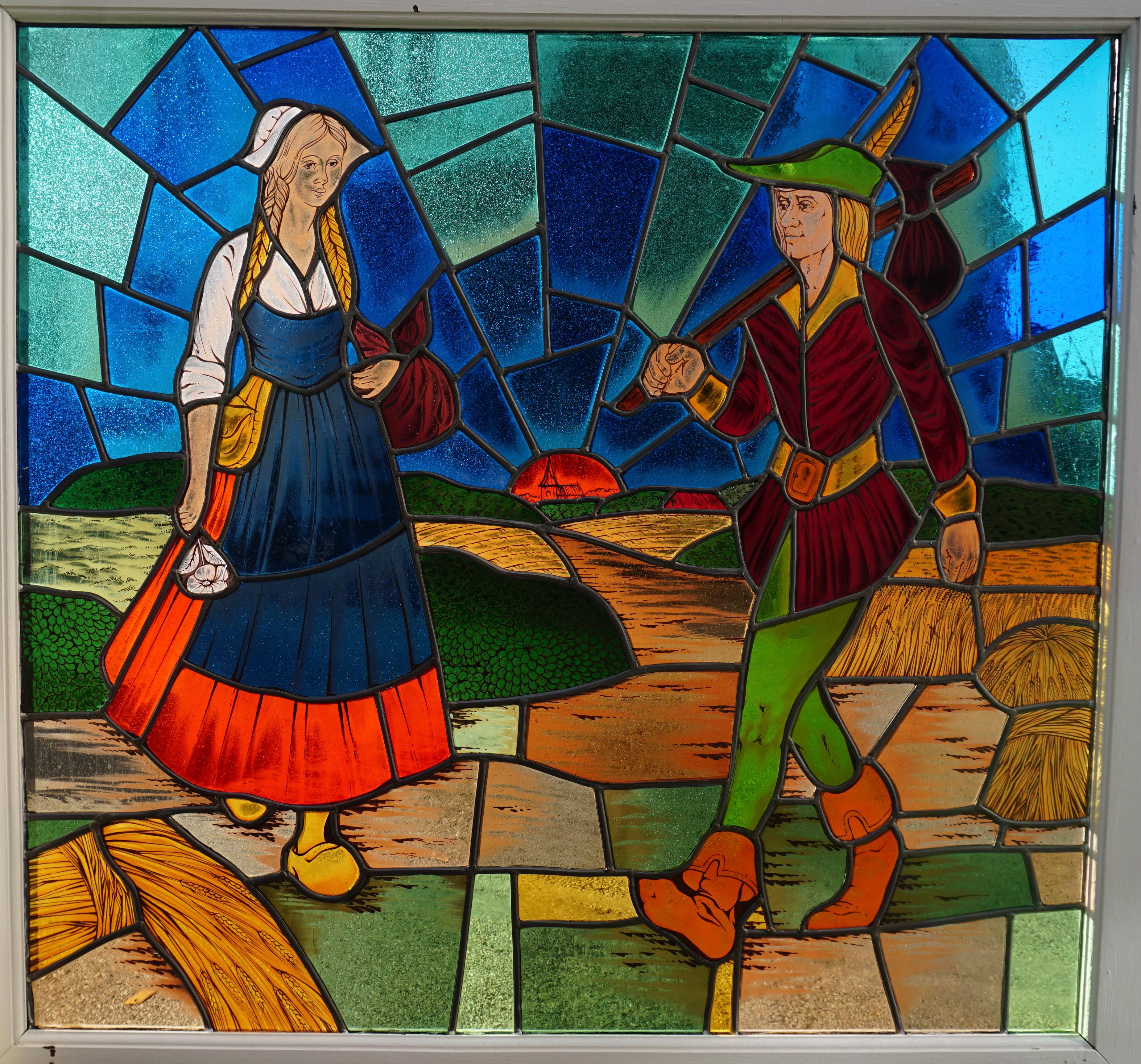 Stained glass work window - Tijl & Nele the legend and the heroic, cheerful and glorious deeds of Tijl Uilenspiegel (Tijl Owlmirror) and Lamme Goedzak in Flanders - 2nd half of the 20th century

This is a pretty and very colorful stained glass