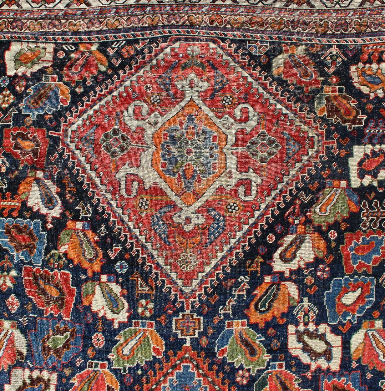 Early 20th Century Colorful Tri-Medallion Antique Persian Qashqai Rug with Detailed Tribal Design For Sale