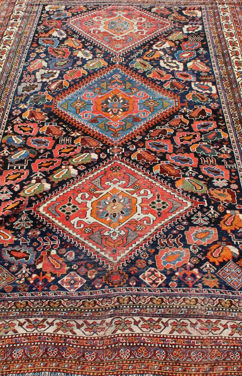 Colorful Tri-Medallion Antique Persian Qashqai Rug with Detailed Tribal Design For Sale 1