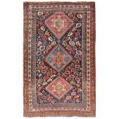 Tappeto antico persiano Qashqai a tre medaglioni colorati con dettagliato disegno tribale