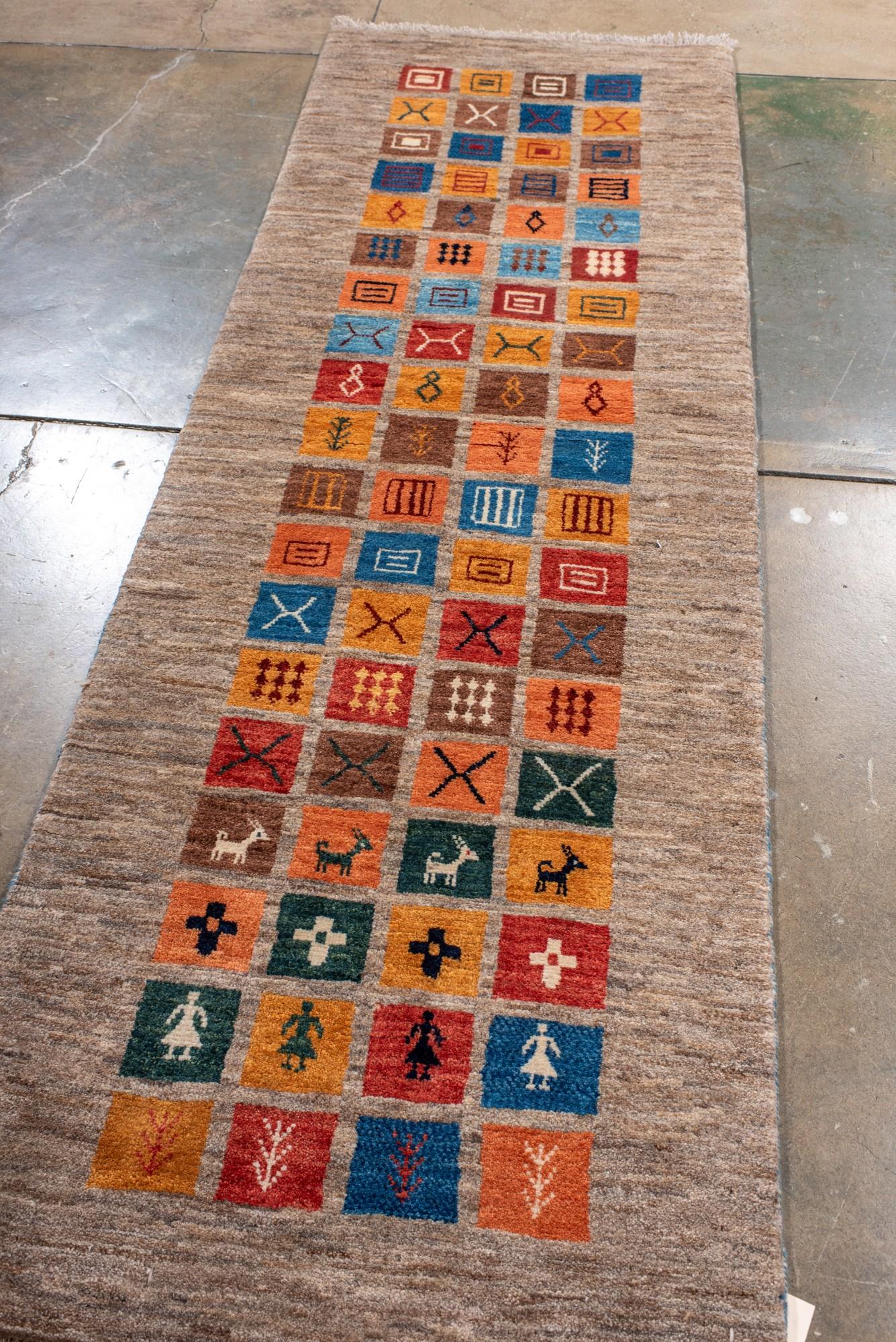 Persian Colorful Tribal Gabbeh Runner with Iconic Motifs For Sale