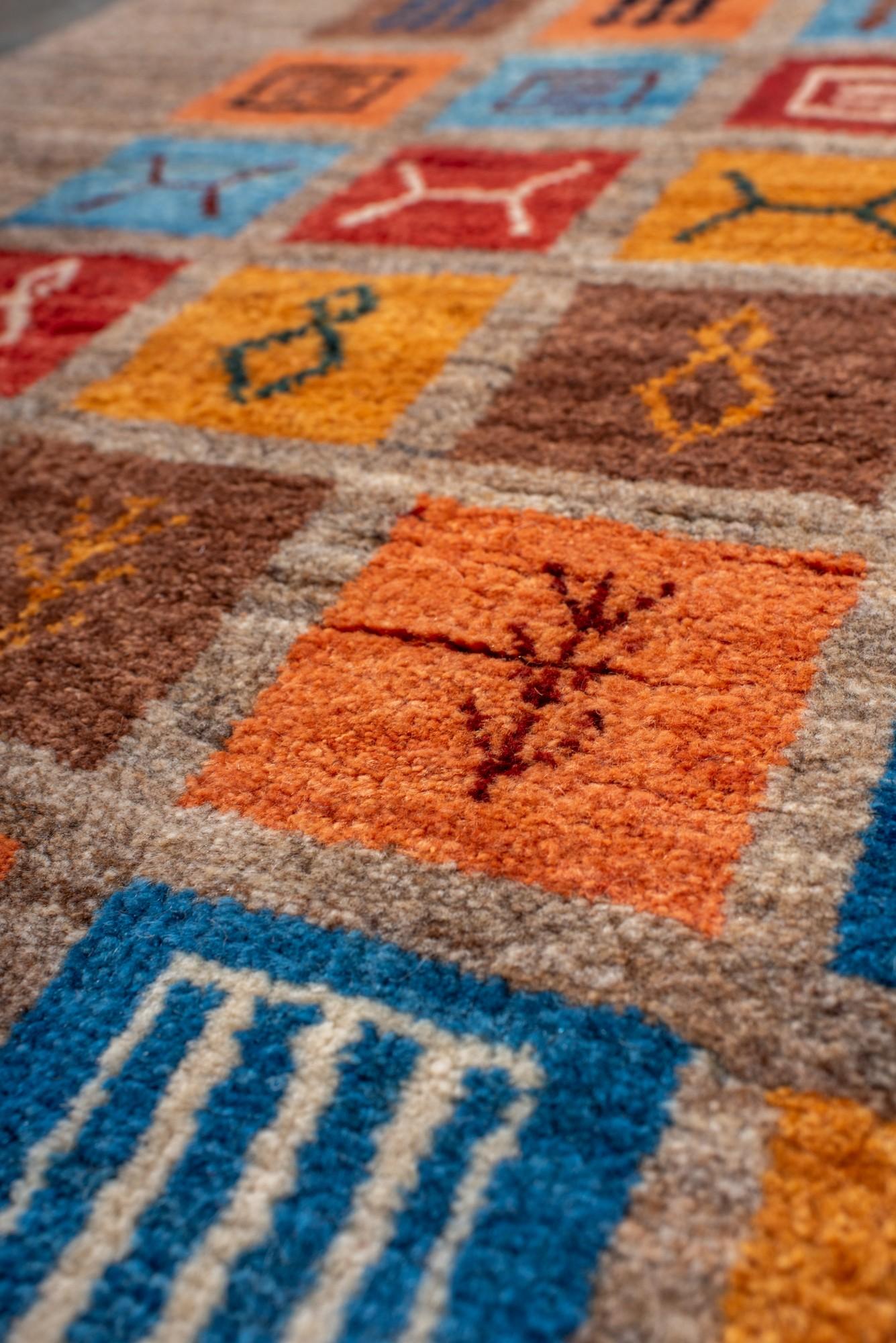 Colorful Tribal Gabbeh Runner with Iconic Motifs In Excellent Condition For Sale In New York, NY