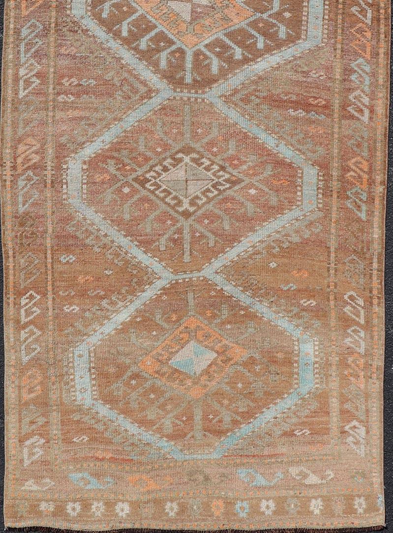 Hand-Knotted Colorful Turkish Kars Runner in Softer Tones with Tribal and Geometric Motifs For Sale