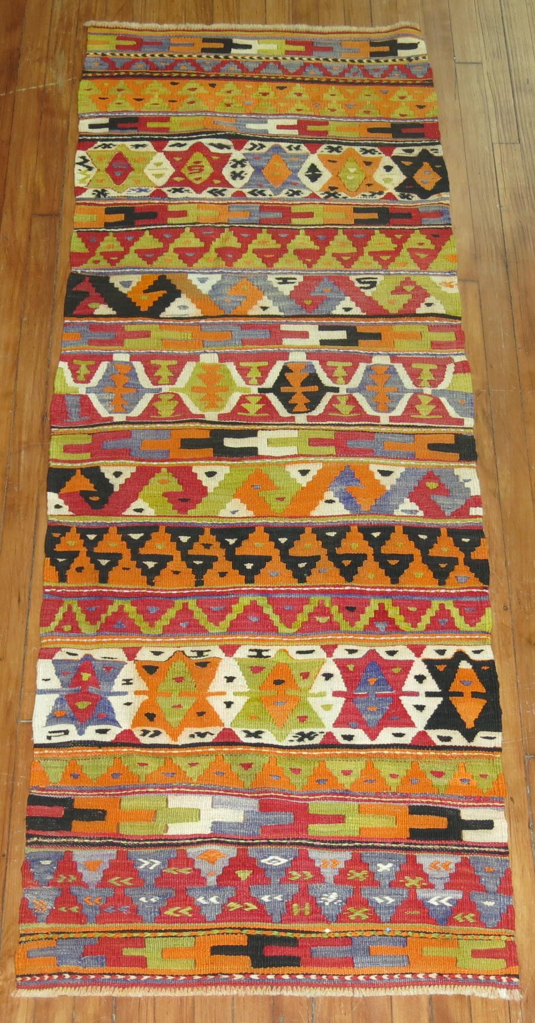 A one of a kind mid-20th century colorful Turkish Kilim runner.

2'6'' x 6'10''.