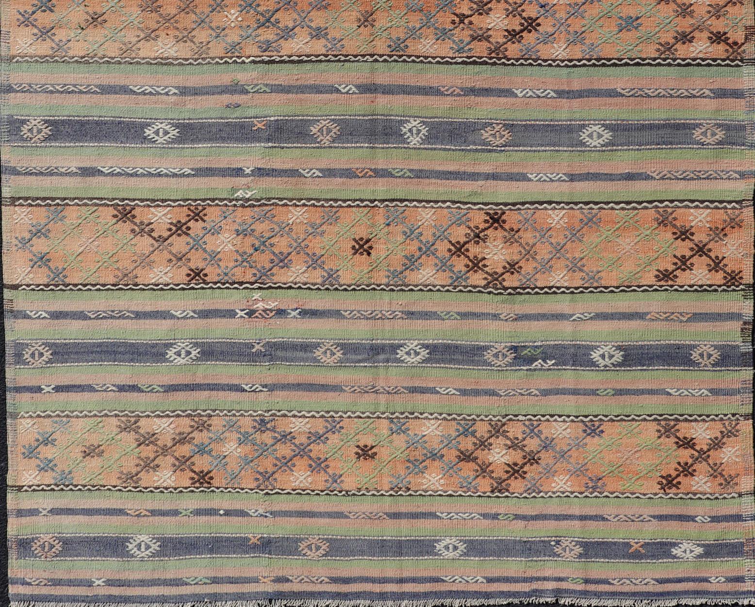 Colorful Turkish Kilim with Stripes and Geometric Elements in Orange and Green In Good Condition For Sale In Atlanta, GA