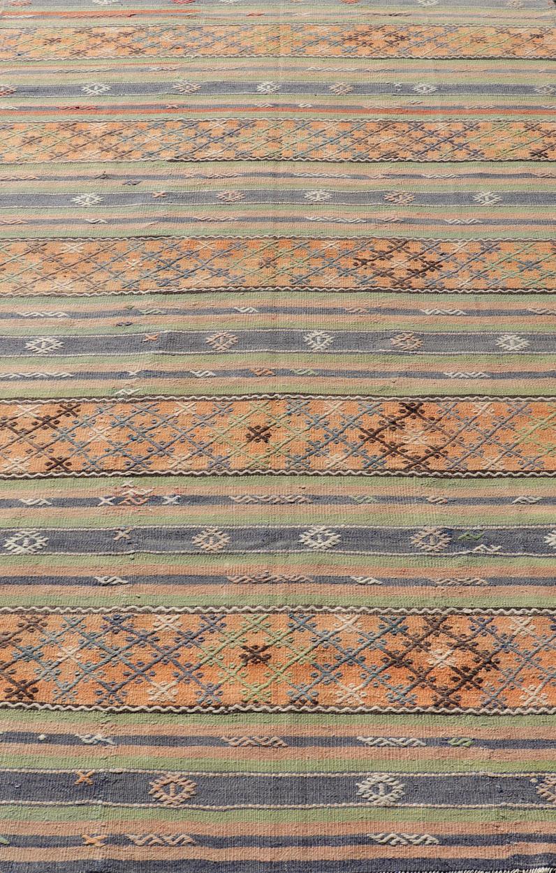 Colorful Turkish Kilim with Stripes and Geometric Elements in Orange and Green For Sale 1