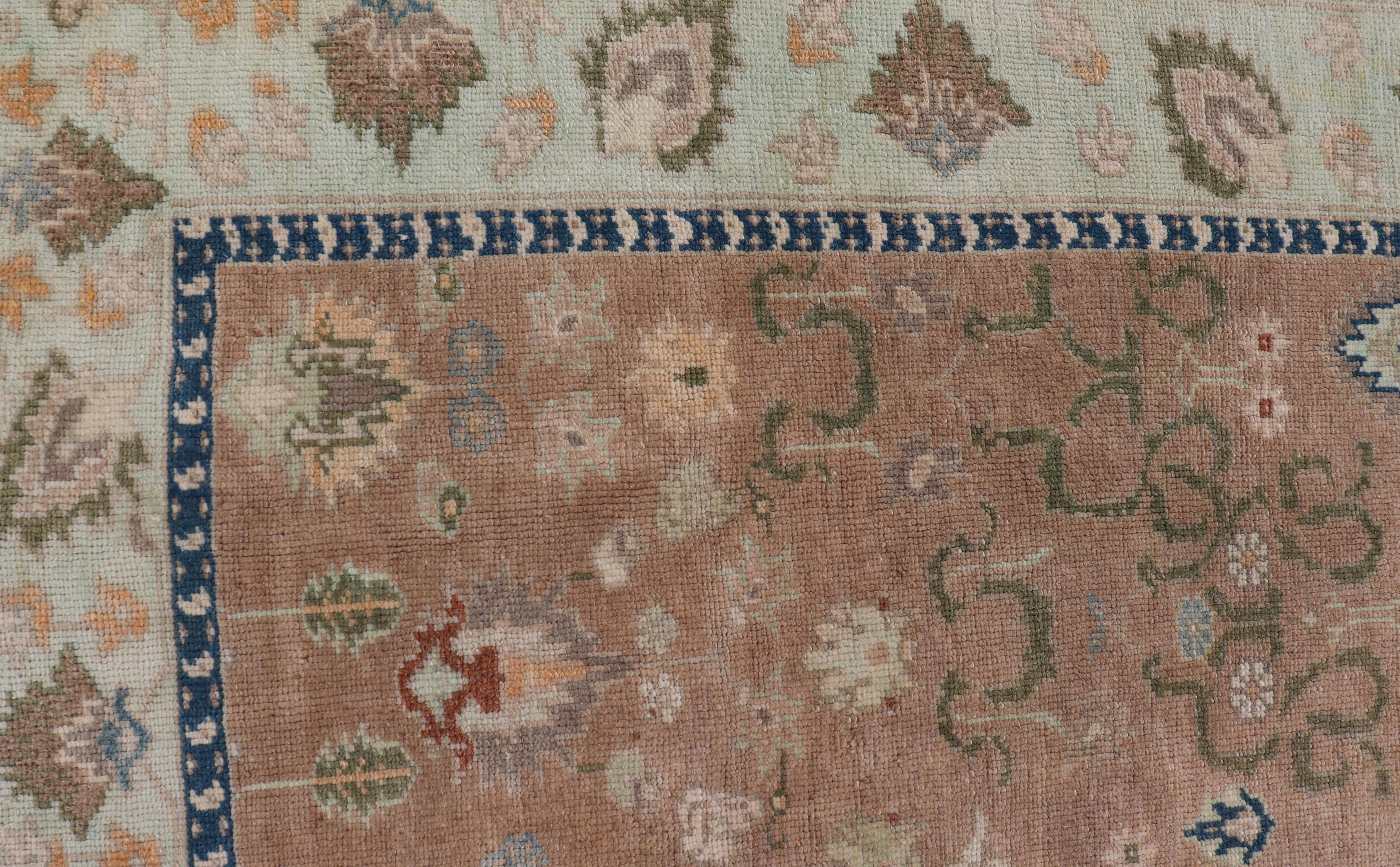 Mid-20th Century Colorful Turkish Oushak Rug in Salmon Background with All-Over Floral Design For Sale