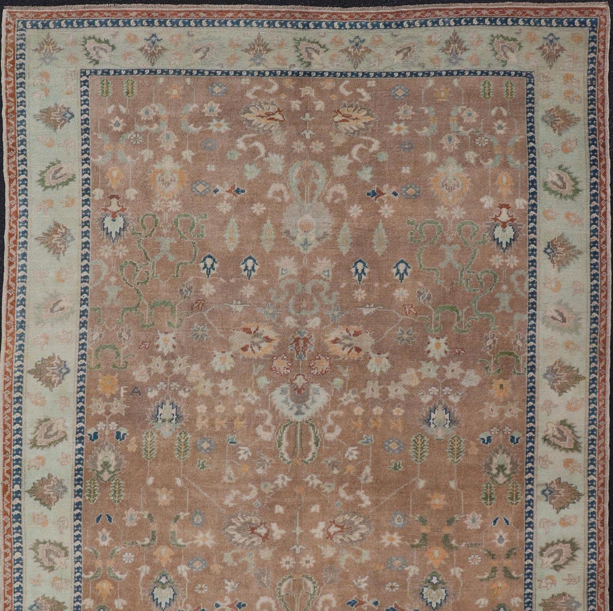 Colorful Turkish Oushak Rug in Salmon Background with All-Over Floral Design For Sale 1