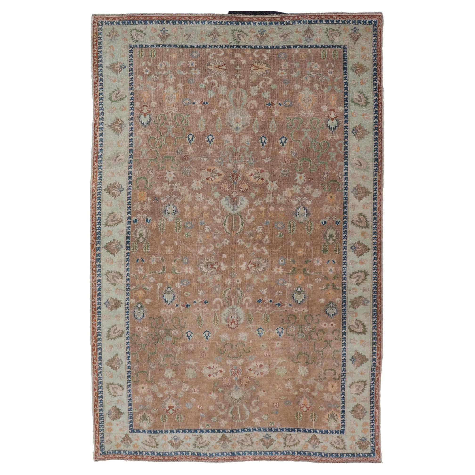 Colorful Turkish Oushak Rug in Salmon Background with All-Over Floral Design For Sale