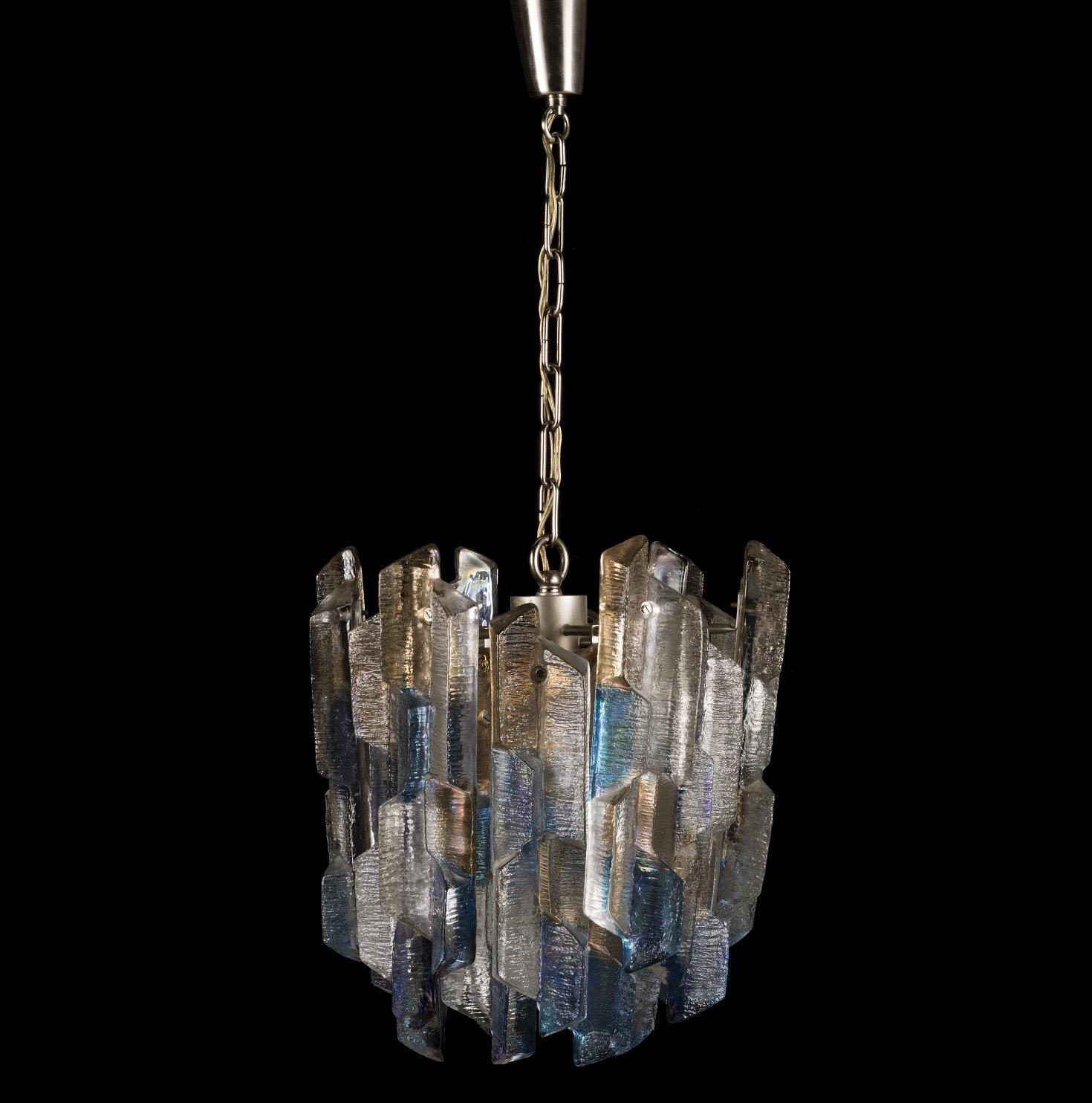 Ultra swanky Kalmar chandelier, Vienna, Austria, 1970.
Metal frame with numerous frosted thick ice looking glass elements that has blue and yellow tint to them, This is by far the most rare production Kalmar ever produced it is in excellent