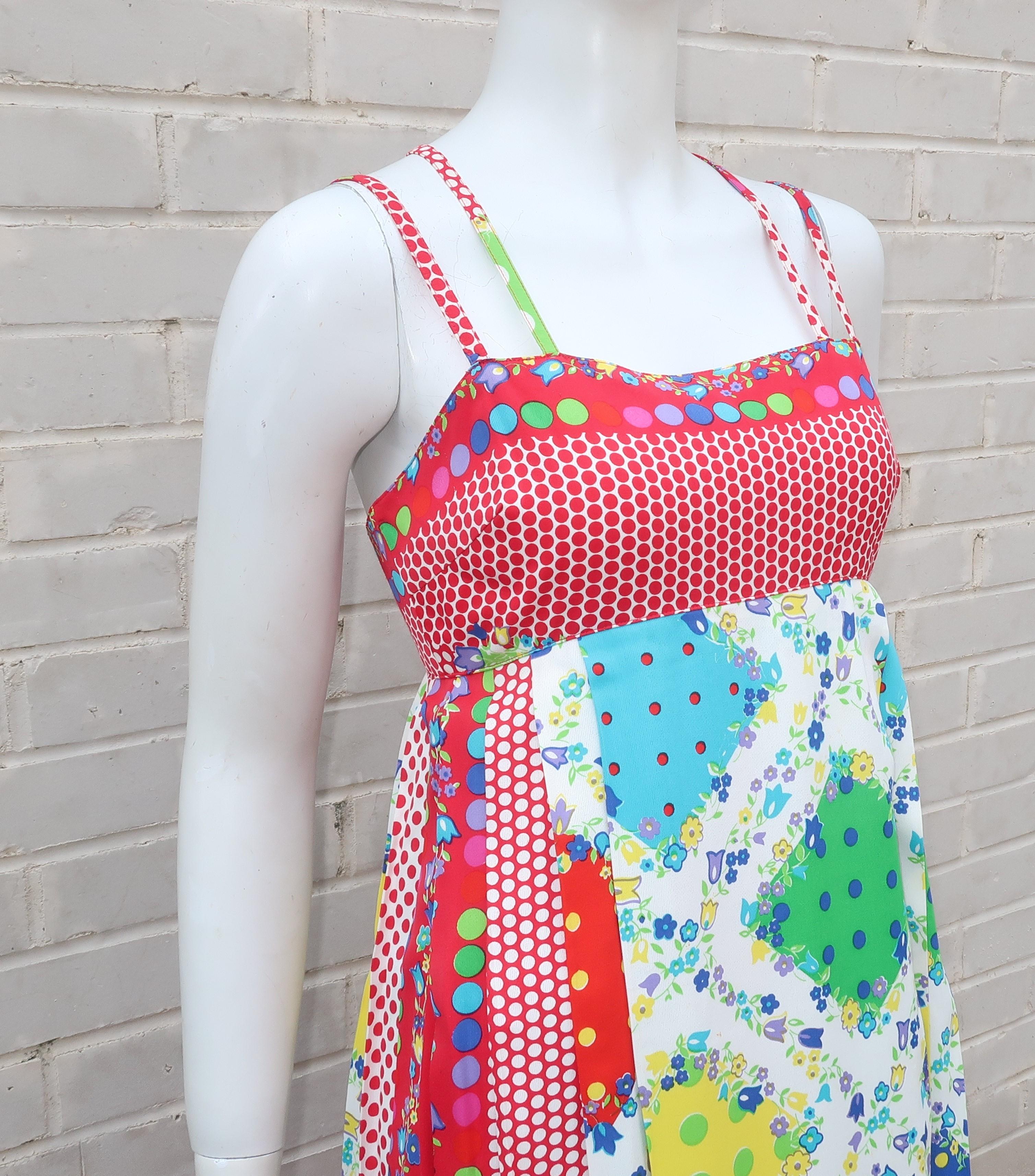 This fun and flirty dress is from Gianni Versace’s youthful label, Versus.  The colorful fabric is reminiscent of summery vintage table linens with a mix of polka dots, gingham and a floral print incorporating shades of red, blue, green and yellow