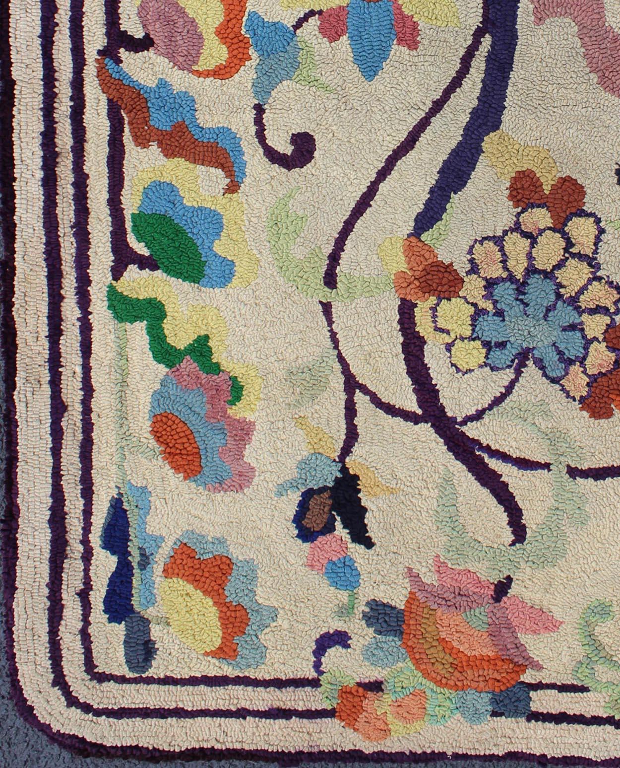 Colorful vintage American hooked rug with branching rainbow-colored flowers, rug l11-0902, country of origin / type: United States / Hooked, circa 1930

This colorful vintage American Hooked rug depicts a variety of vining flowers in an assorted