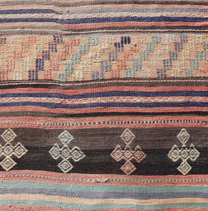 Measures: 2'10 x 11'9 
Colorful Vintage Embroidered Kilim Runner with Stripe's and Geometric Motifs. Keivan Woven Arts / rug TU-NED-5001, country of origin / type: Turkey / Kilim, circa 1950.
This vintage Kilim displays an array of designs,