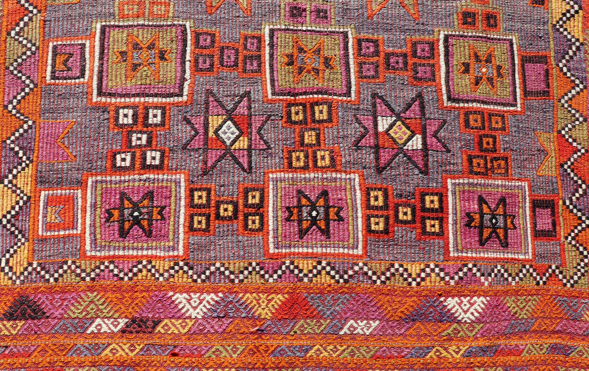 Measures: 5'7 x 9'10 
Colorful Vintage Kilim Embroidered Jajeem with Square and Star Design In Purple. Keivan Woven Arts / rug TU-NED-4697, country of origin / type: Turkey / Kilim, circa 1950
Featuring tribal shapes of stars and boxes with a