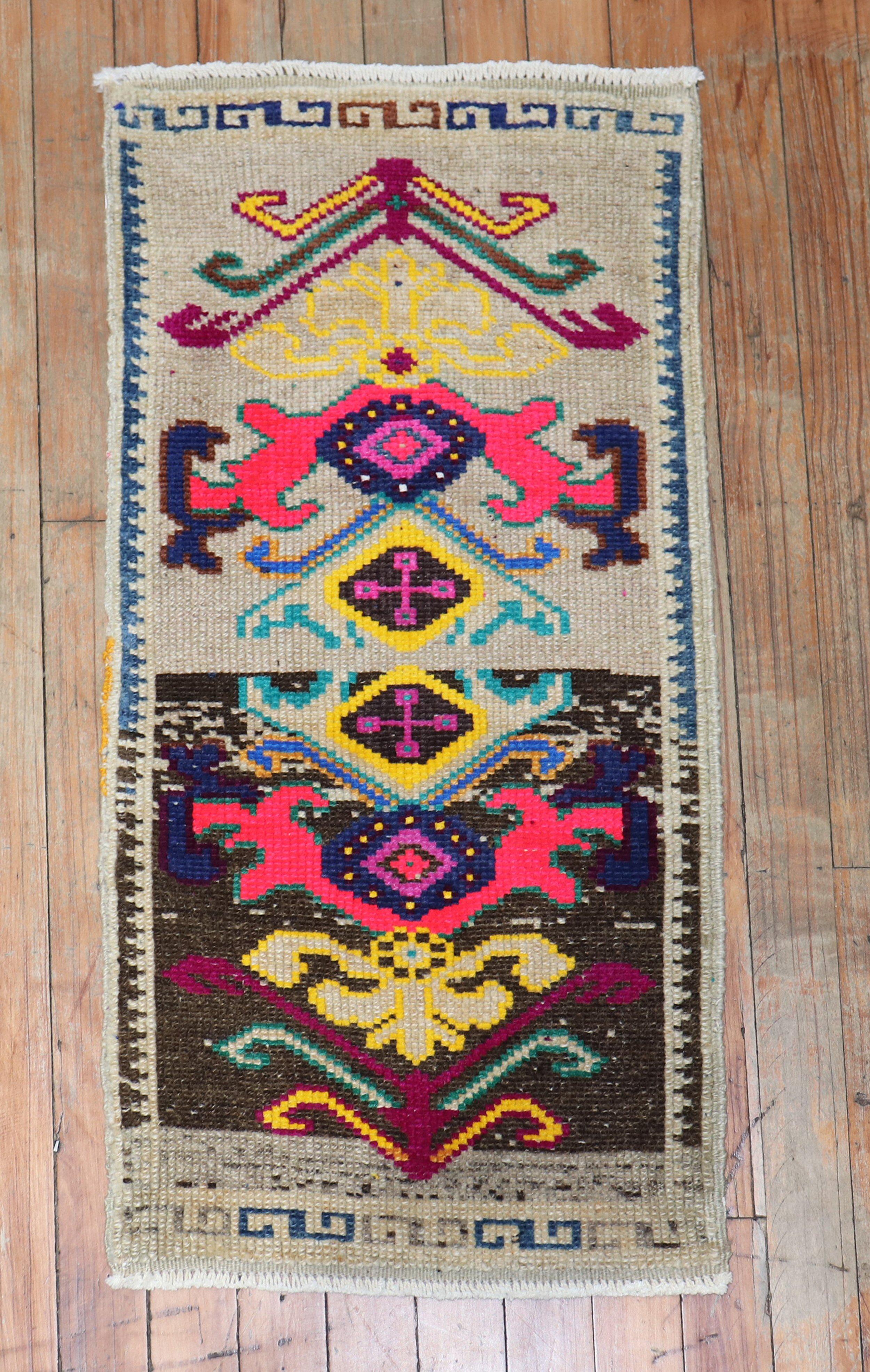 Quirky vintage Turkish Anatolian rug featuring vibrant colors.

Measures: 1'4'' x 2'9
