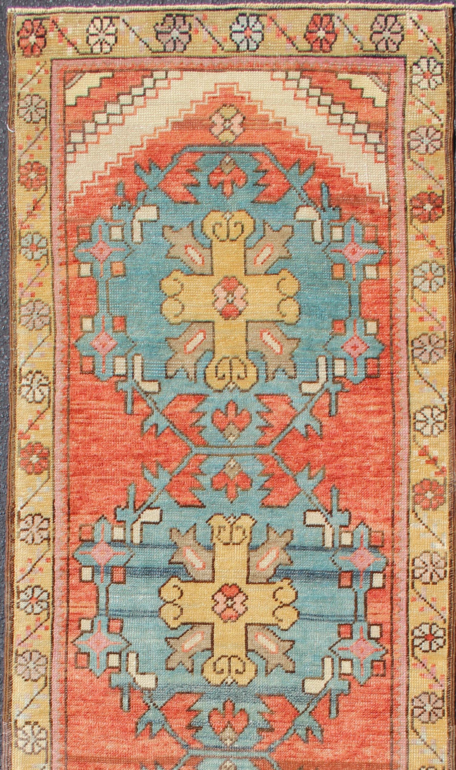 Colorful Turkish Antique Oushak runner in Terracotta, Yellow & teal Blue , rug EN-179659, country of origin / type: Turkey / Oushak, circa 1930.

This vintage Turkish Oushak runner features four layered medallions expanding across the central field.