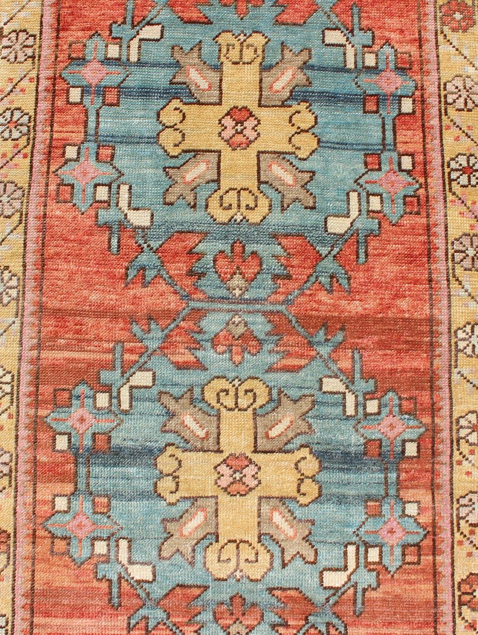 Hand-Knotted Colorful Antique Oushak Runner with Medallion Design in Terracotta & teal Blue For Sale