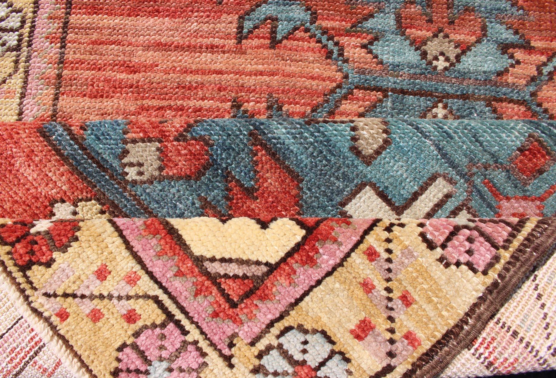 20th Century Colorful Antique Oushak Runner with Medallion Design in Terracotta & teal Blue For Sale