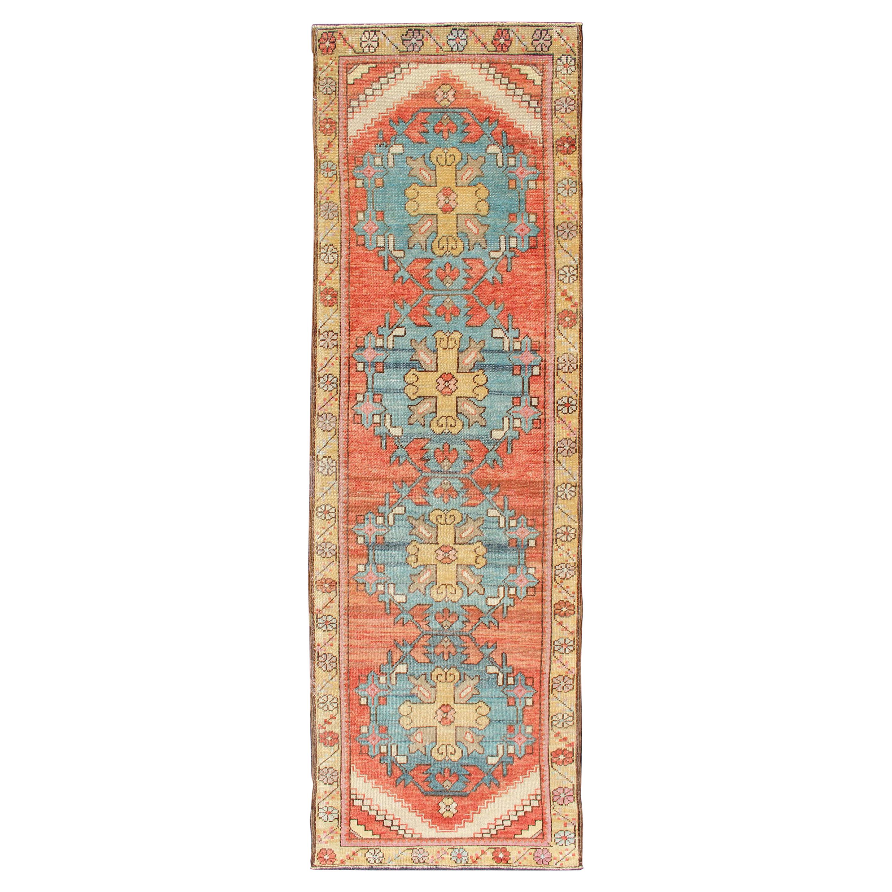 Colorful Antique Oushak Runner with Medallion Design in Terracotta & teal Blue For Sale