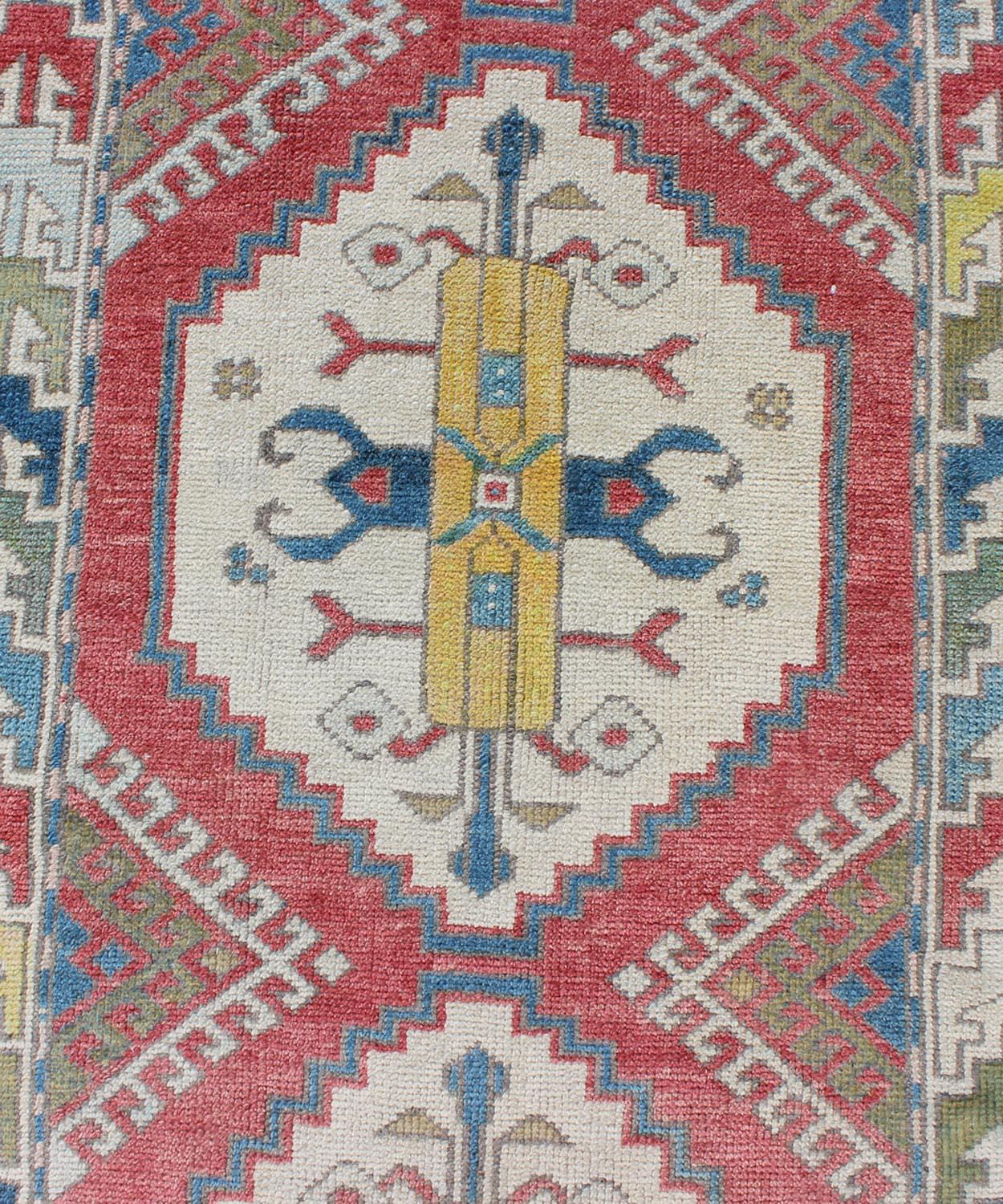 20th Century Colorful Vintage Oushak Turkish Narrow Runner with Geometric Design For Sale