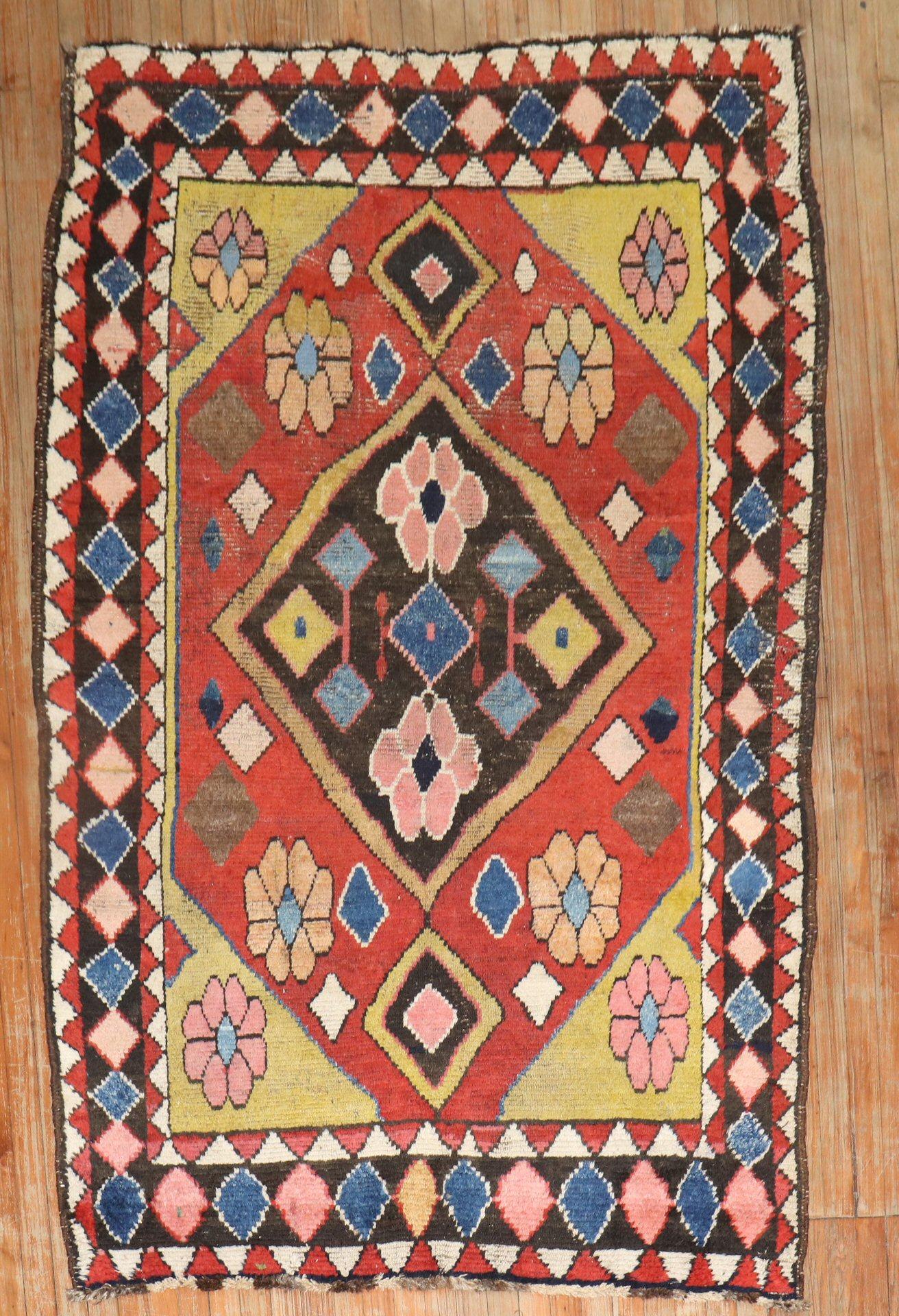A Mid-20th Century Persian Gabbeh rug 

Measures: 4'8'' x 6'11''.