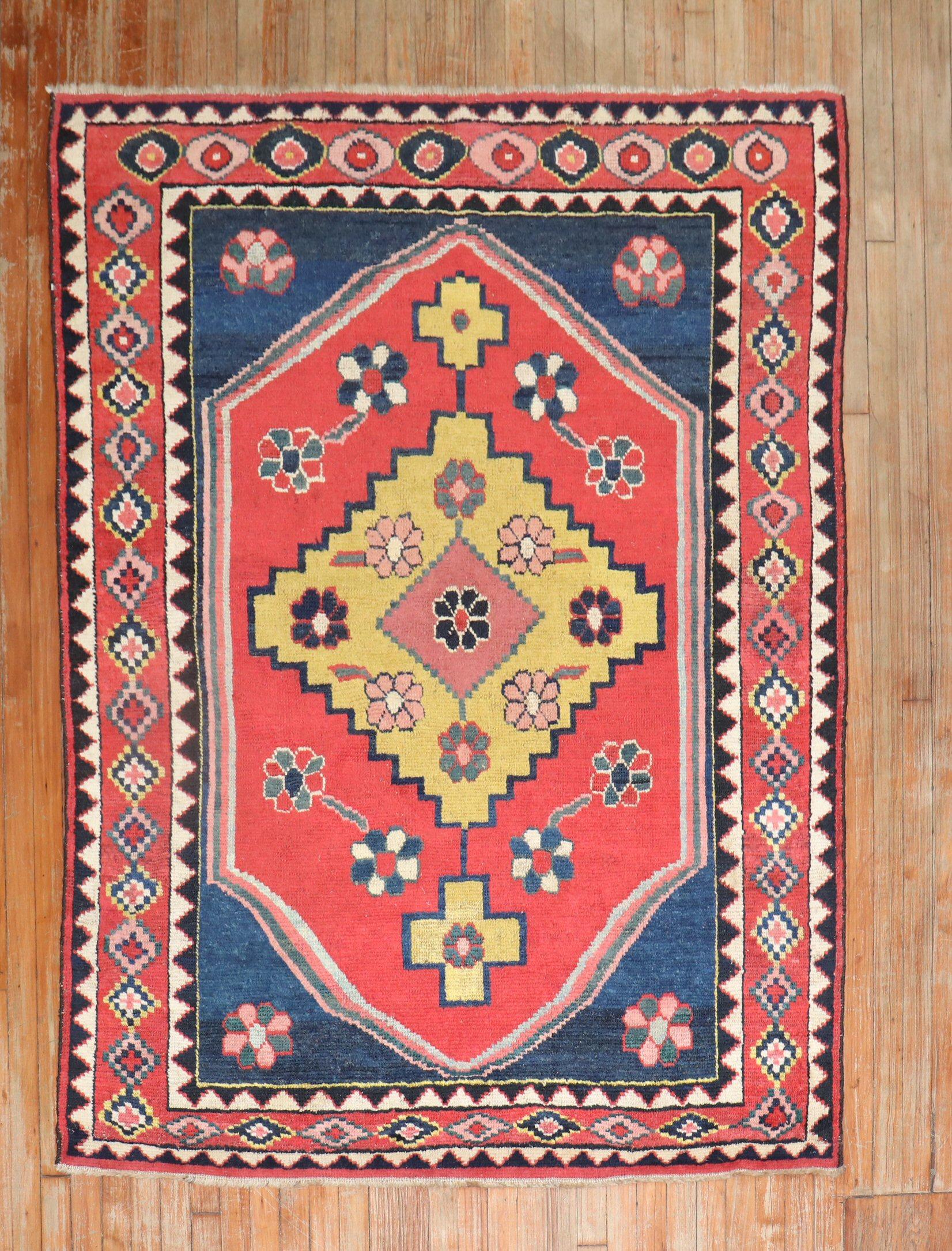 A Mid-20th Century Persian gabbeh colorful square rug.

Measures: 5''' x 6'6''.