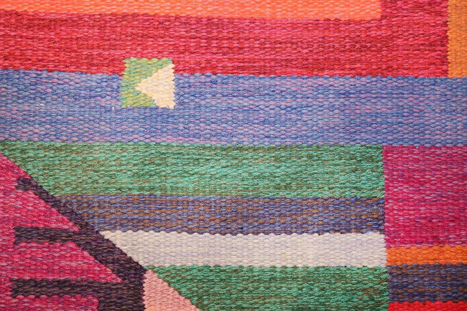 Magnificent and Colorful Vintage Scandinavian Agda Osterberg Kilim Rug, Country of Origin / Rug Type: Scandinavia Rug, Circa Date: Mid 20th Century. Size: 5 ft 5 in x 8 ft 5 in (1.65 m x 2.57 m).