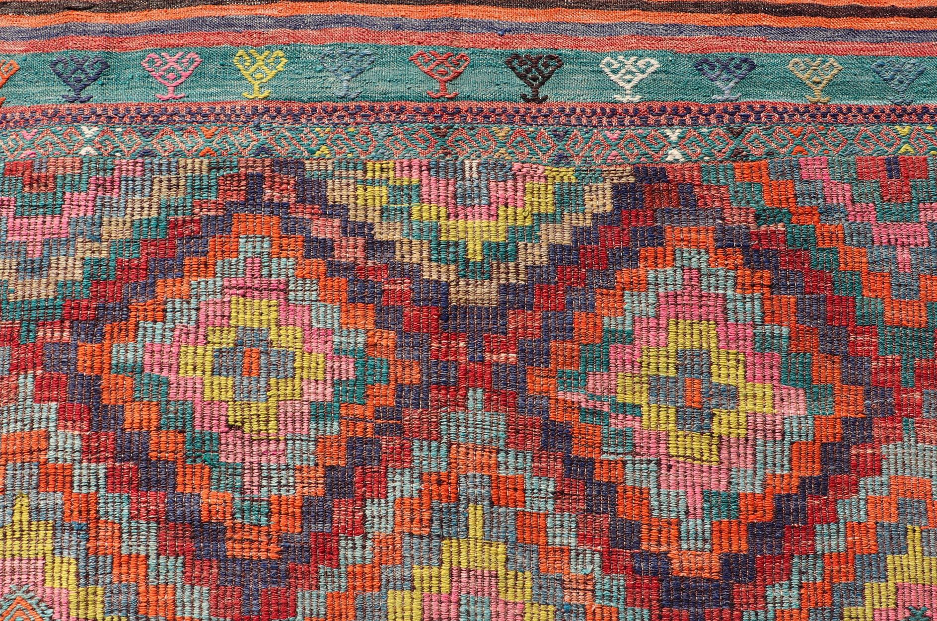 Measures: 6'5 x 8'9 
Colorful Vintage Turkish Flat-Weave Tribal Modern Kilim with Embroideries. Keivan Woven Arts / rug TU-NED-4698, country of origin / type: Turkey / Kilim, circa mid-20th Century.

Rendered in diamond shapes with a spotted and