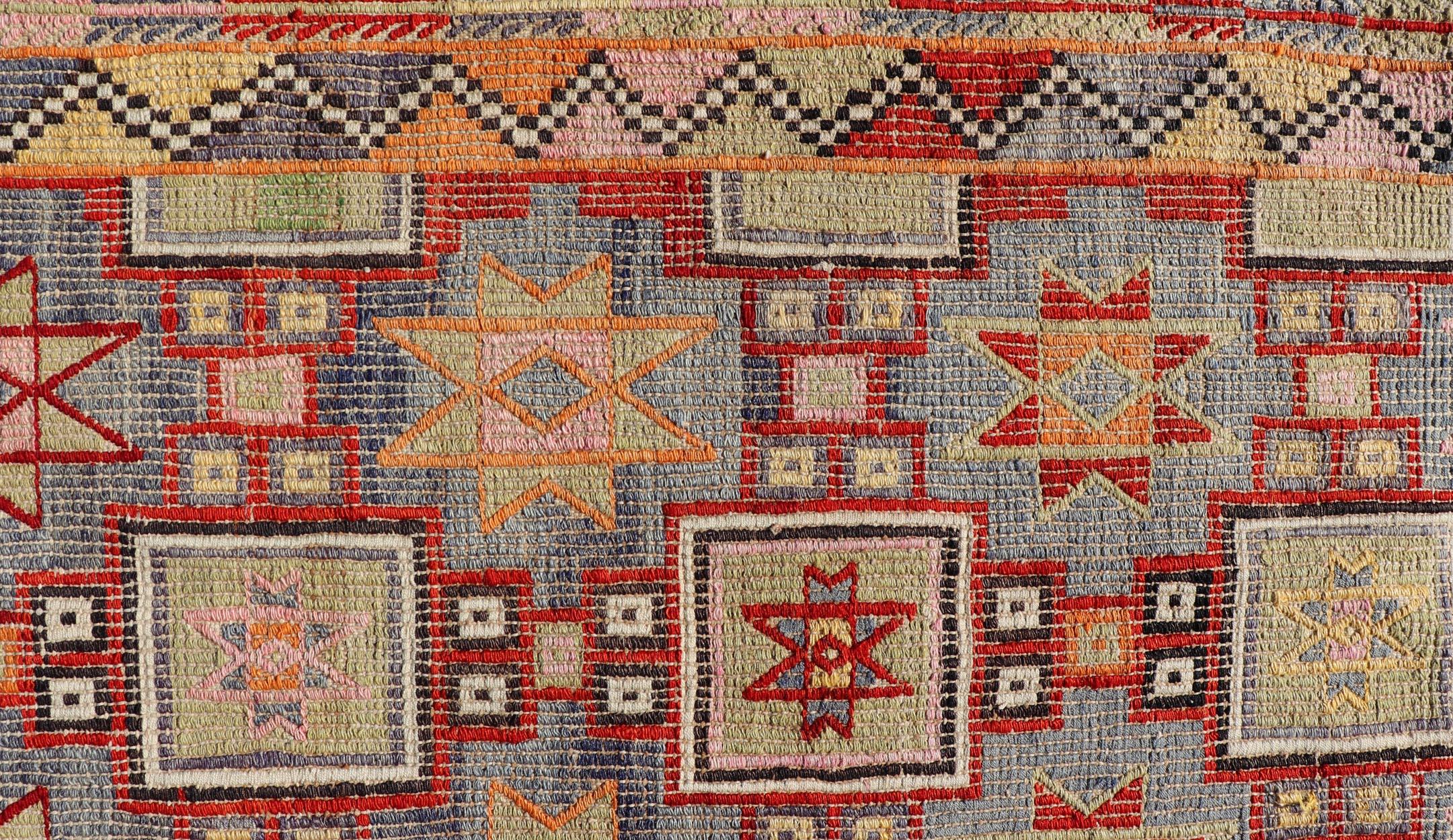 Measures: 6'4 x 8'9 
Colorful Vintage Turkish Kilim Embroidered with Star Design in Gray and Green. Keivan Woven Arts / rug / TU-NED-4699, country of origin / type: Turkey / Kilim, circa 1950
Featuring tribal shapes of stars and boxes with a spotted