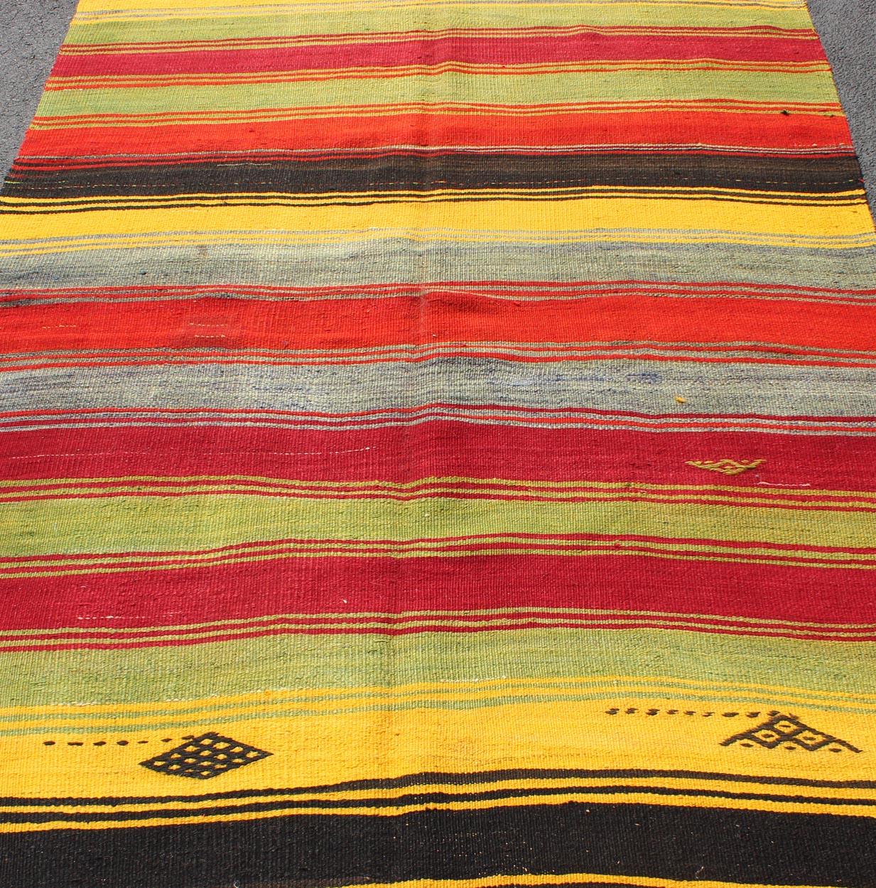 Colorful Vintage Turkish Kilim Rug with Subtle Tribal Shapes and Stripes Design For Sale 4