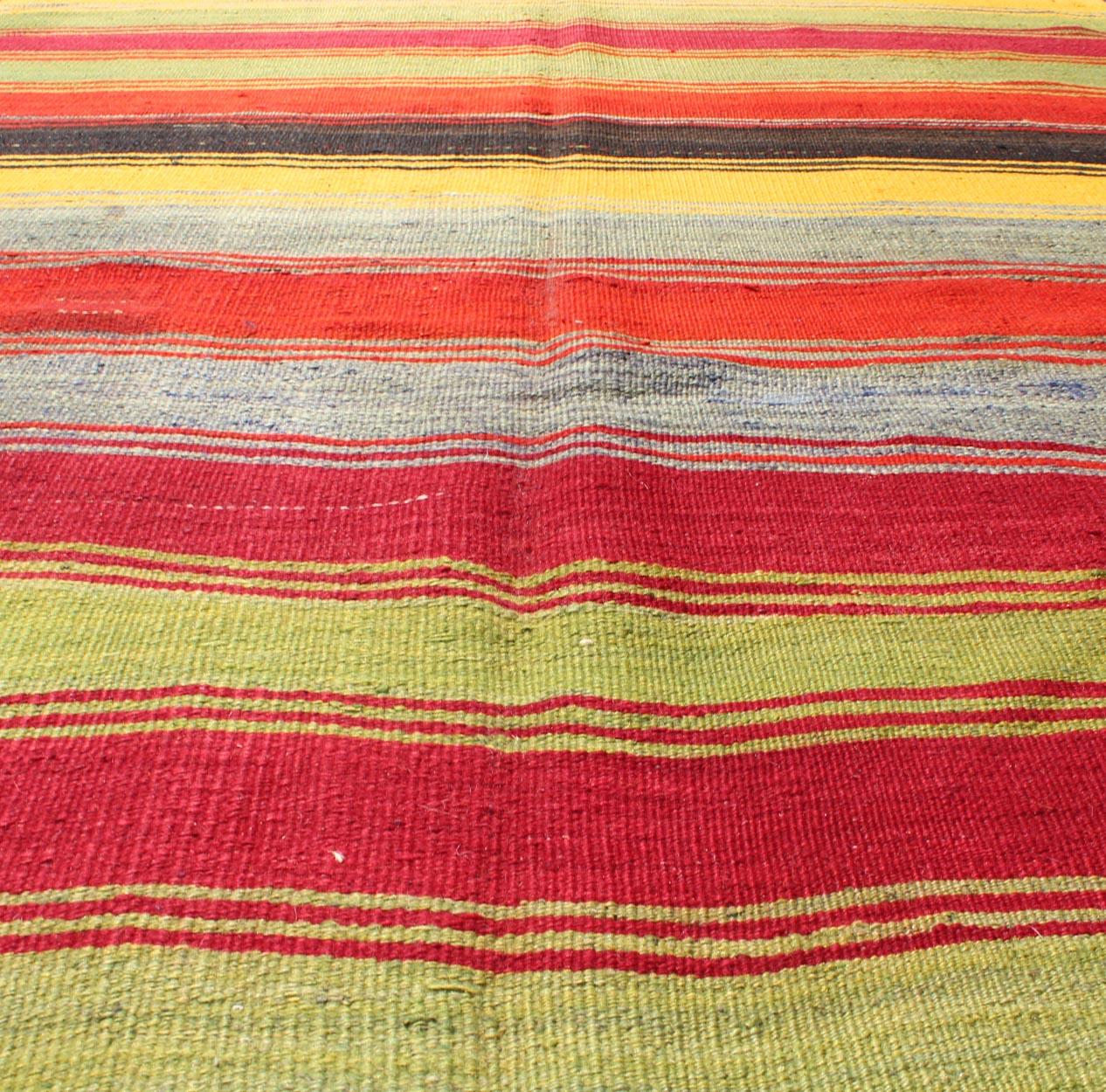 Colorful Vintage Turkish Kilim Rug with Subtle Tribal Shapes and Stripes Design For Sale 5