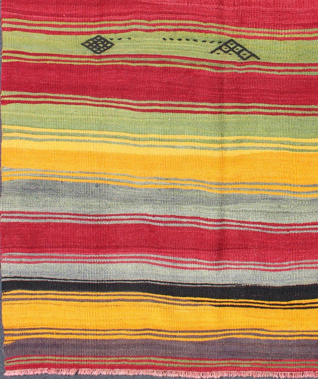Bright & Colorful Vintage Turkish Kilim Rug in Stripes Design, Keivan Woven Arts/rug/TU-MTU-95043, country of origin / type: Turkey / Kilim, circa mid-20th century, bright color Kilim, Vivid colors vintage Kilim

Measures: 5 x 7'1. 

Featuring a