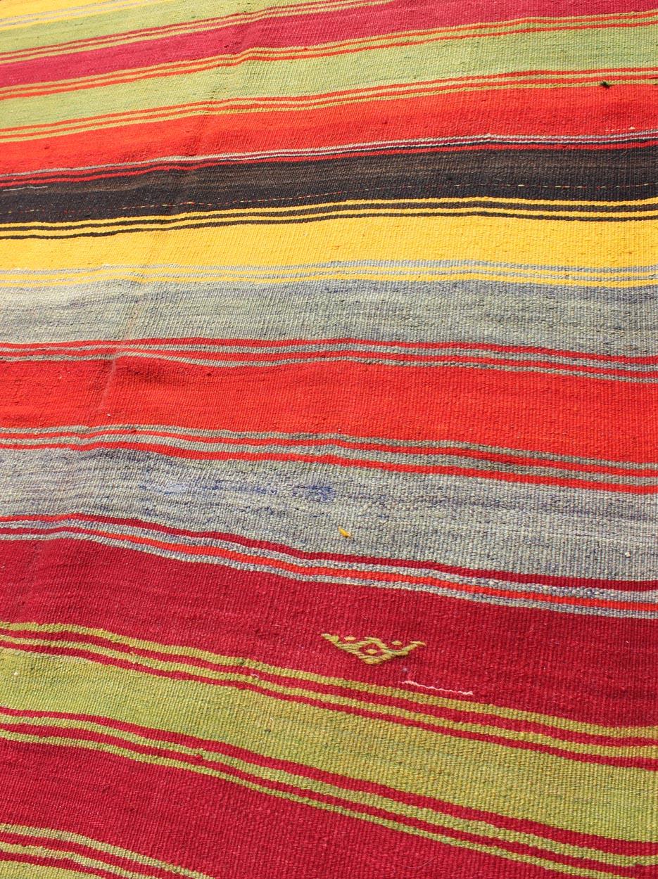 Colorful Vintage Turkish Kilim Rug with Subtle Tribal Shapes and Stripes Design For Sale 3