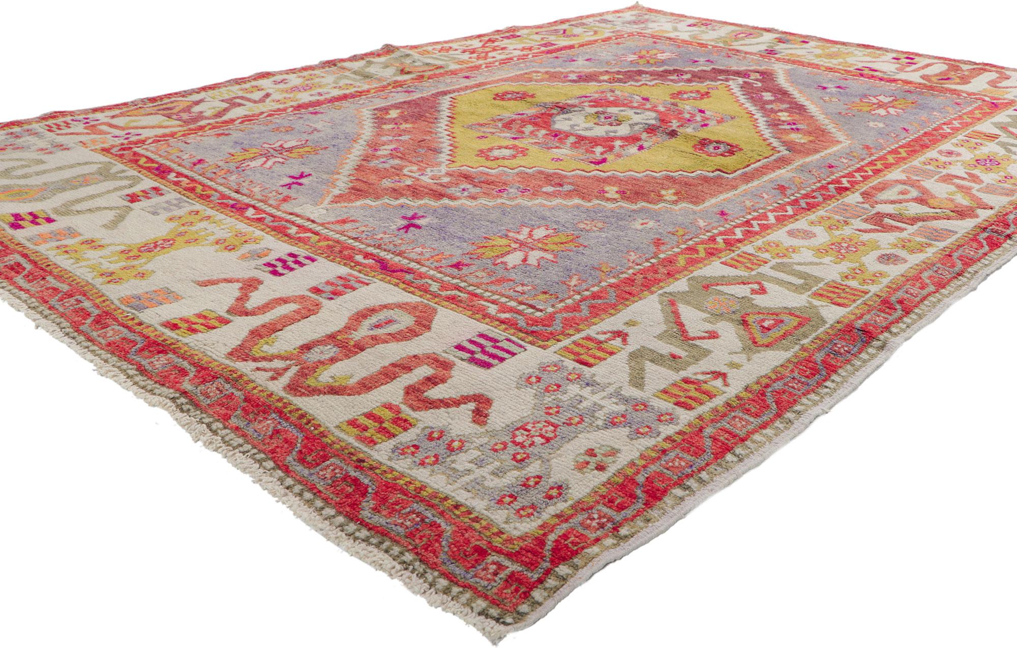 51782 Vintage Turkish Oushak Rug, 05'11 x 08'04.
Showcasing a bold expressive design, incredible detail and texture, this hand knitted wool vintage Turkish Oushak rug is a captivating vision of woven beauty. The eye-catching medallion design and