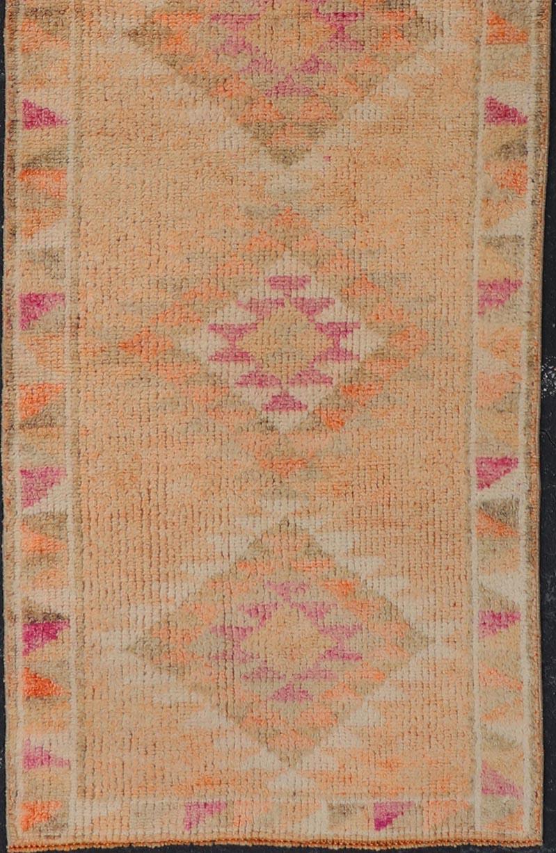 20th Century Colorful Vintage Turkish Oushak Runner with Diamond Medallions For Sale