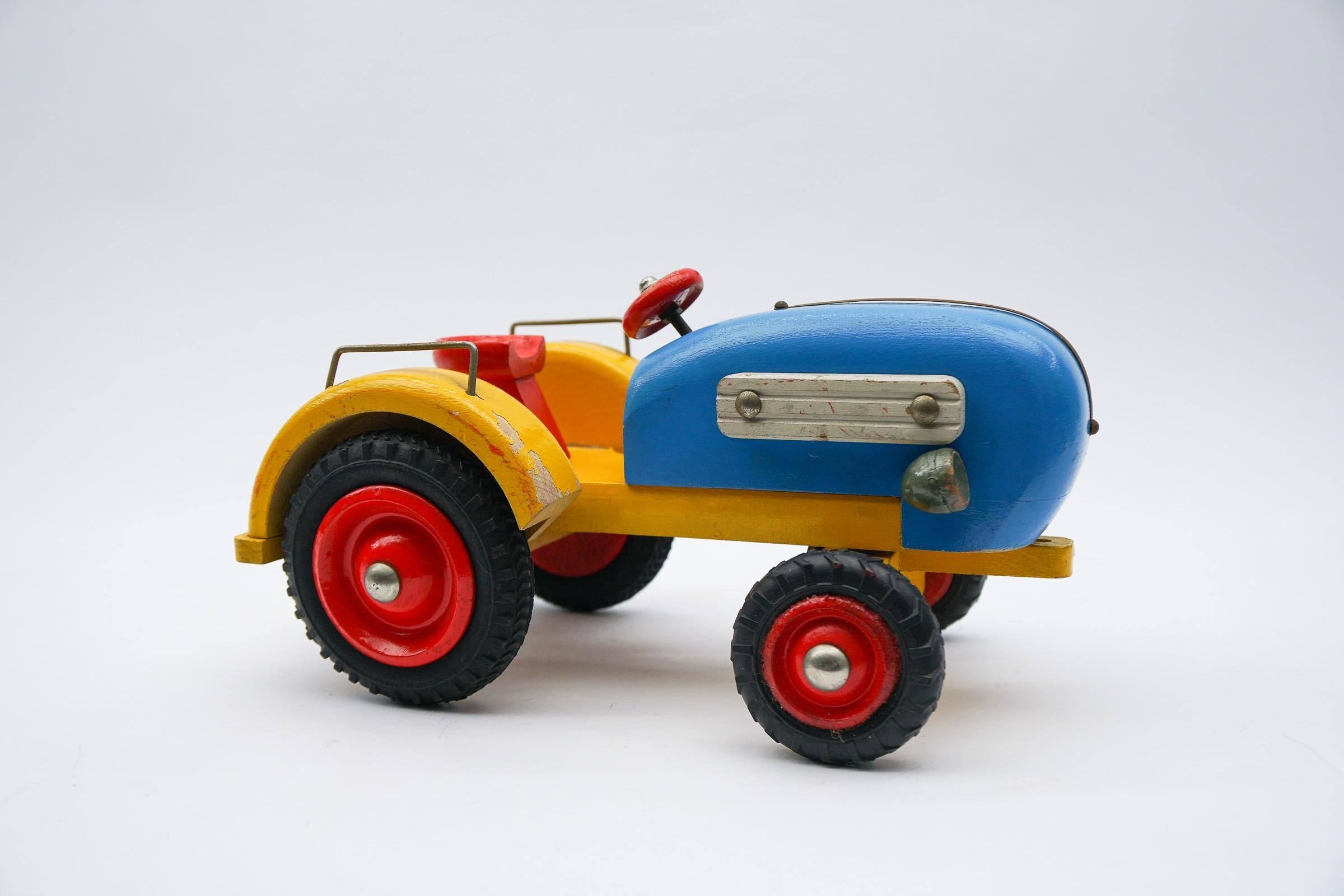 Mid-Century Modern Colorful Waldorf School Tractor with Movable Front Axle, 1950s Germany For Sale