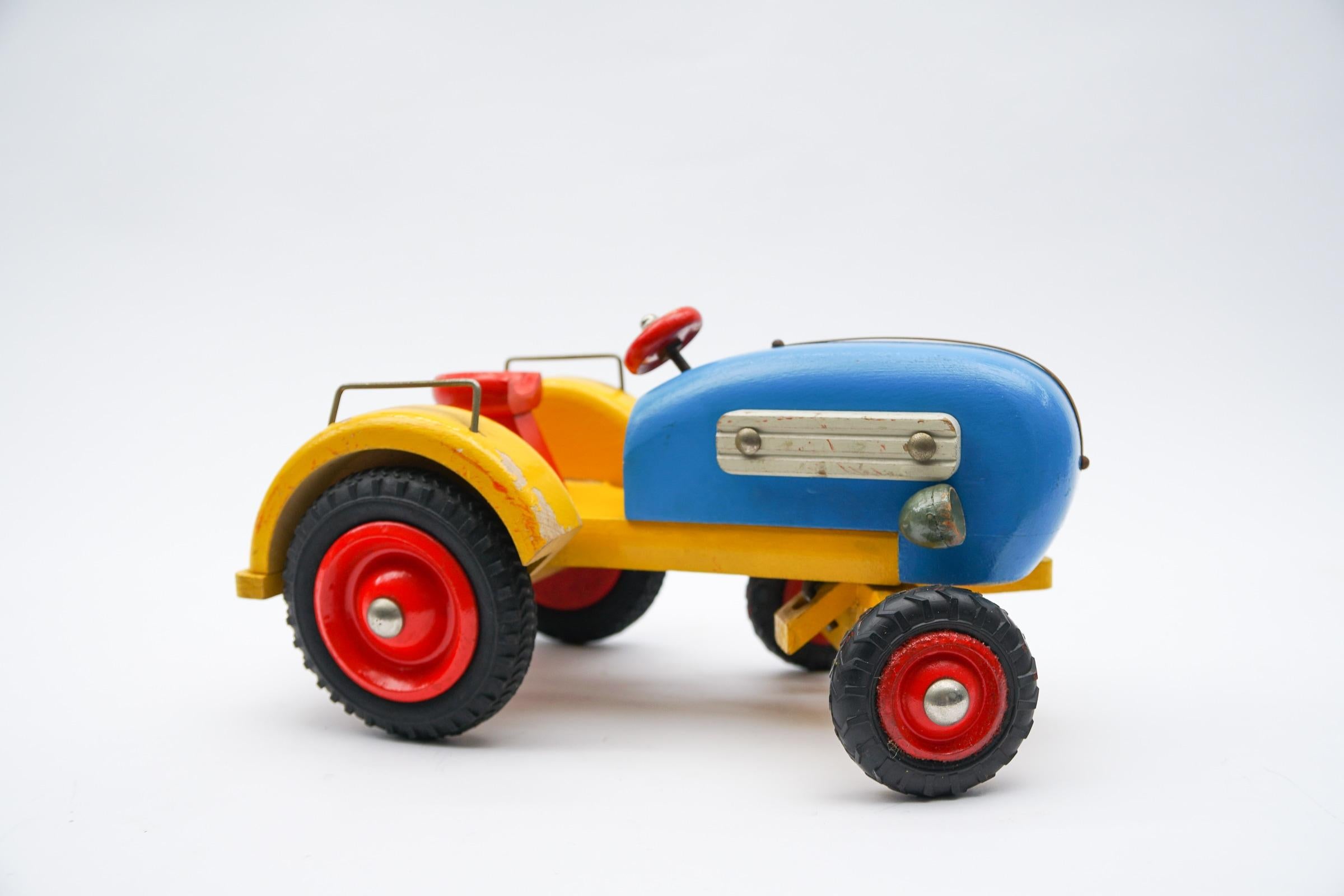 Lacquered Colorful Waldorf School Tractor with Movable Front Axle, 1950s Germany For Sale