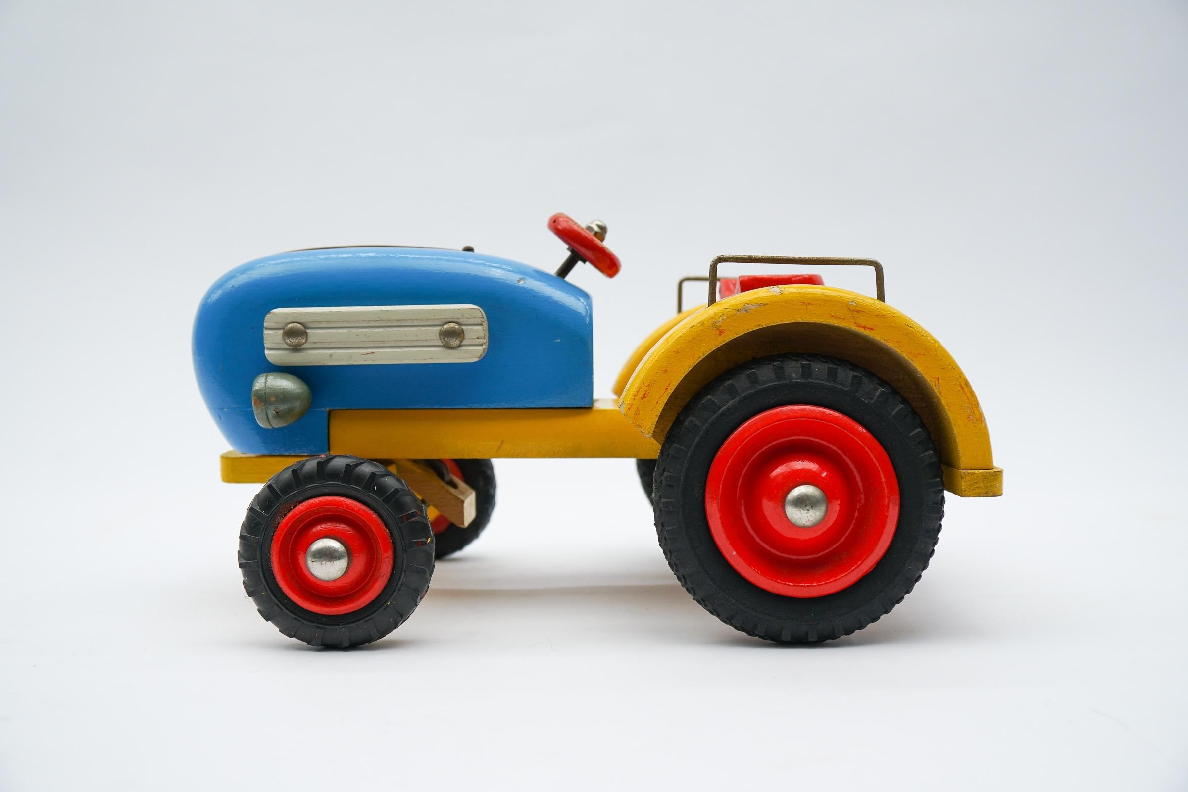 Mid-20th Century Colorful Waldorf School Tractor with Movable Front Axle, 1950s Germany For Sale