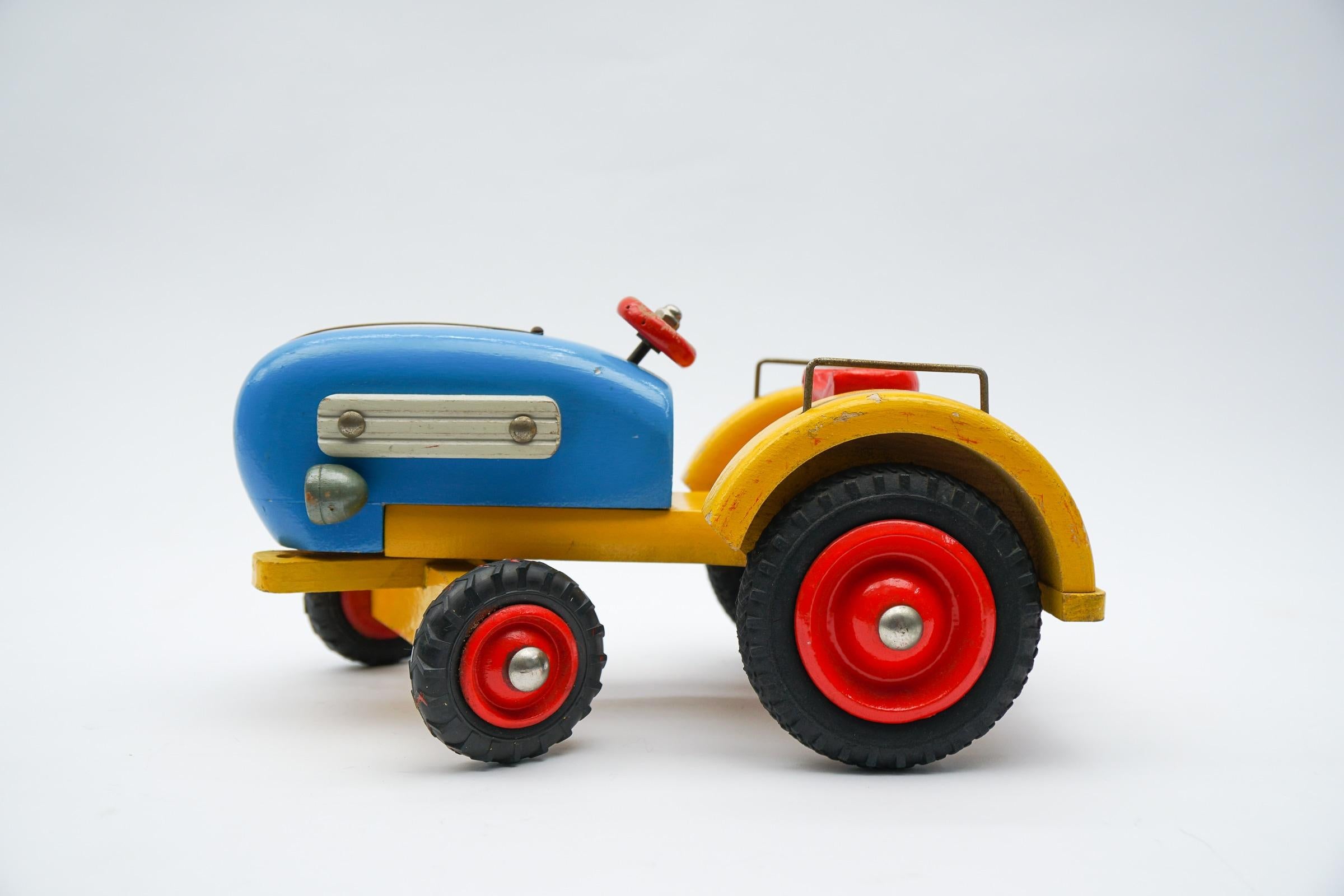 Metal Colorful Waldorf School Tractor with Movable Front Axle, 1950s Germany For Sale