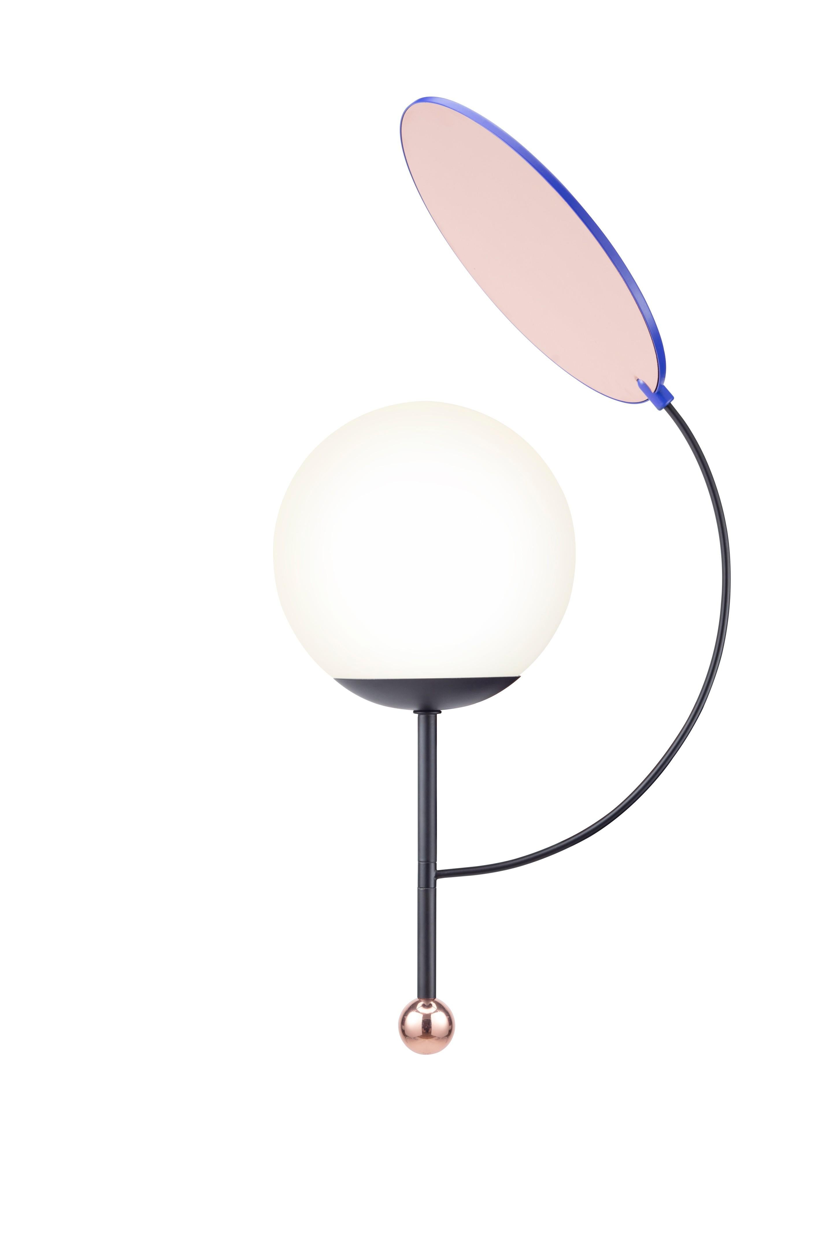 Colorful wall lamp by Thomas Dariel, Maison Dada
Dia24 * H57.2 cm
Base and arm – Black powder coated metal with matte finish
Plated metal ball coated with glossy Copper finish
Rotating Top – Blue powder coated metal / plated metal with glossy Copper