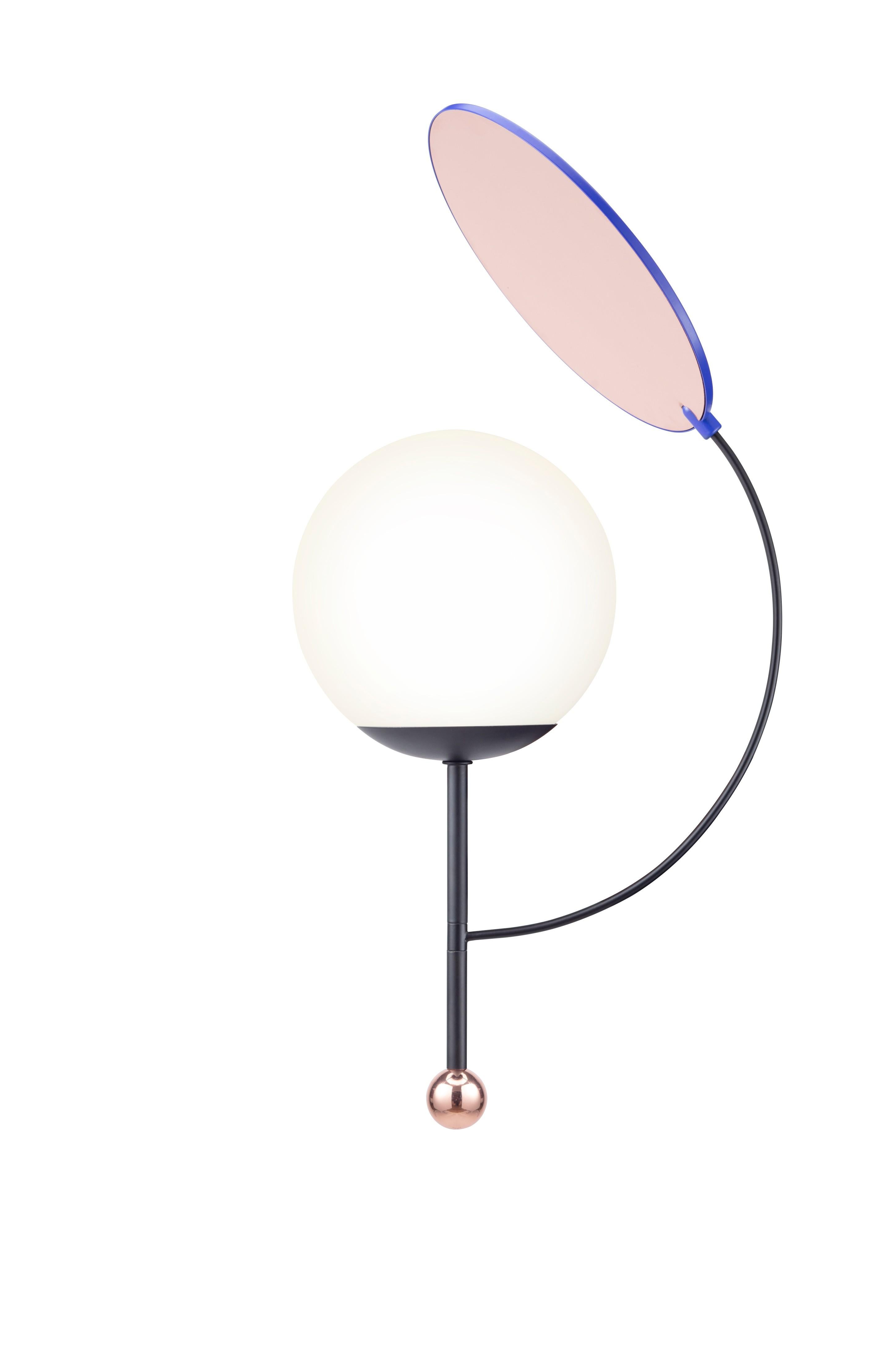 Colorful wall lamp by Thomas Dariel, Maison Dada
Measures: diameter 24 * height 57.2 cm
Base and arm – Black powder coated metal with matte finish
Plated metal ball coated with glossy Copper finish
Rotating Top – Blue powder coated metal /