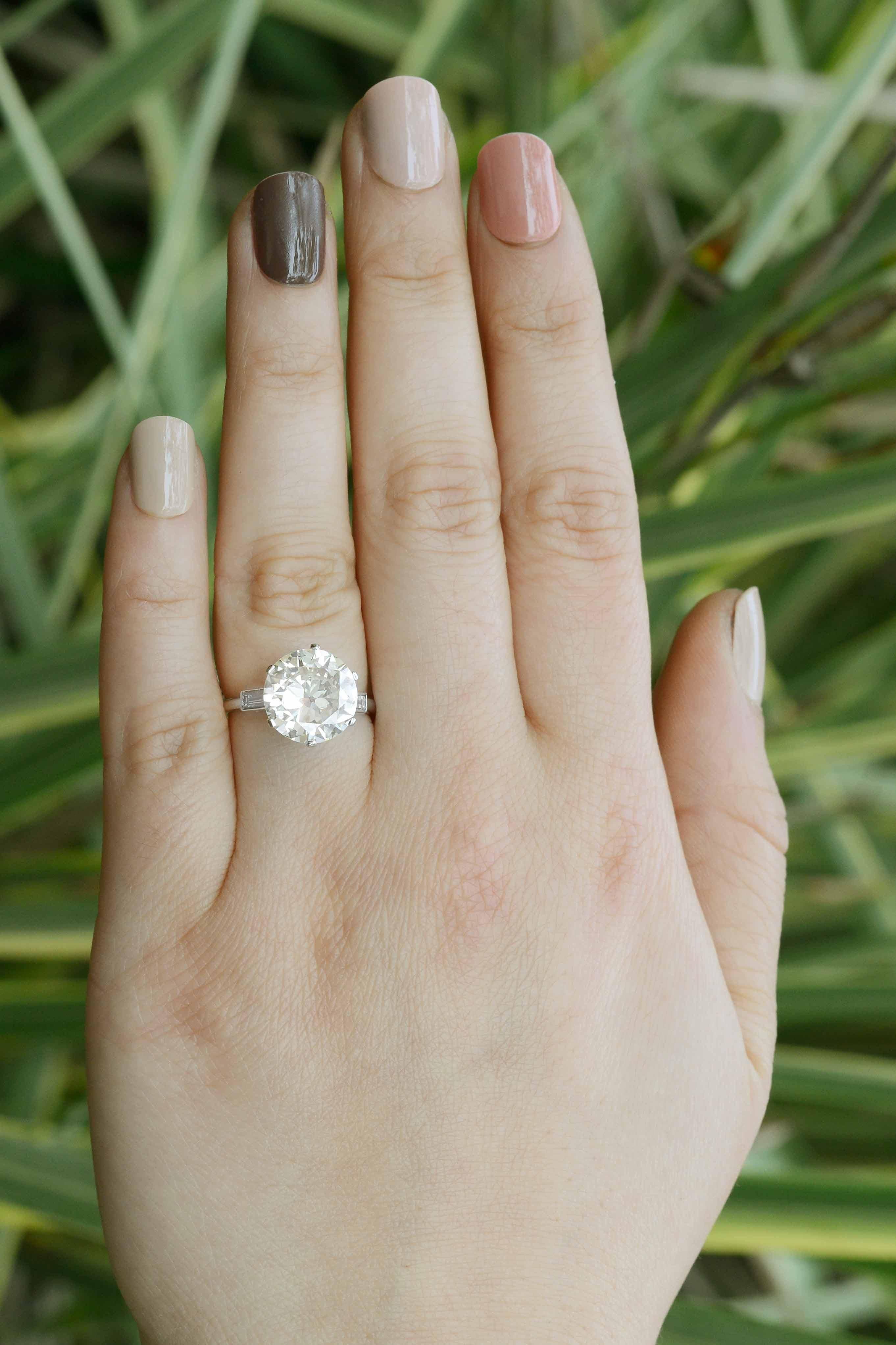 The Santa Monica is a colossal 4 carat diamond solitaire engagement ring, GIA Certified with a vintage, Art Deco 1920s heritage. Appearing more like an old European cut than a round brilliant, and with a warm tone that sends sparks of fire in every