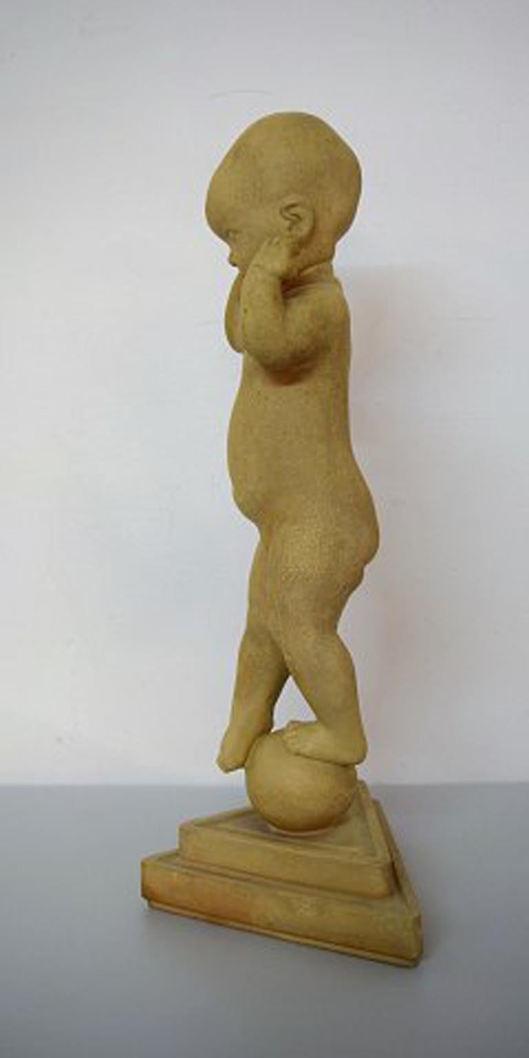 Colossal Kai Nielsen (1882-1924) figure of terracotta, 'A little Globetrotter' also referred to as 'Nina on the ball, standing' produced at Kähler.
Height 79 cm.
In perfect condition.
Literature: Ane Maria & Annimi Holst Schmidt: 