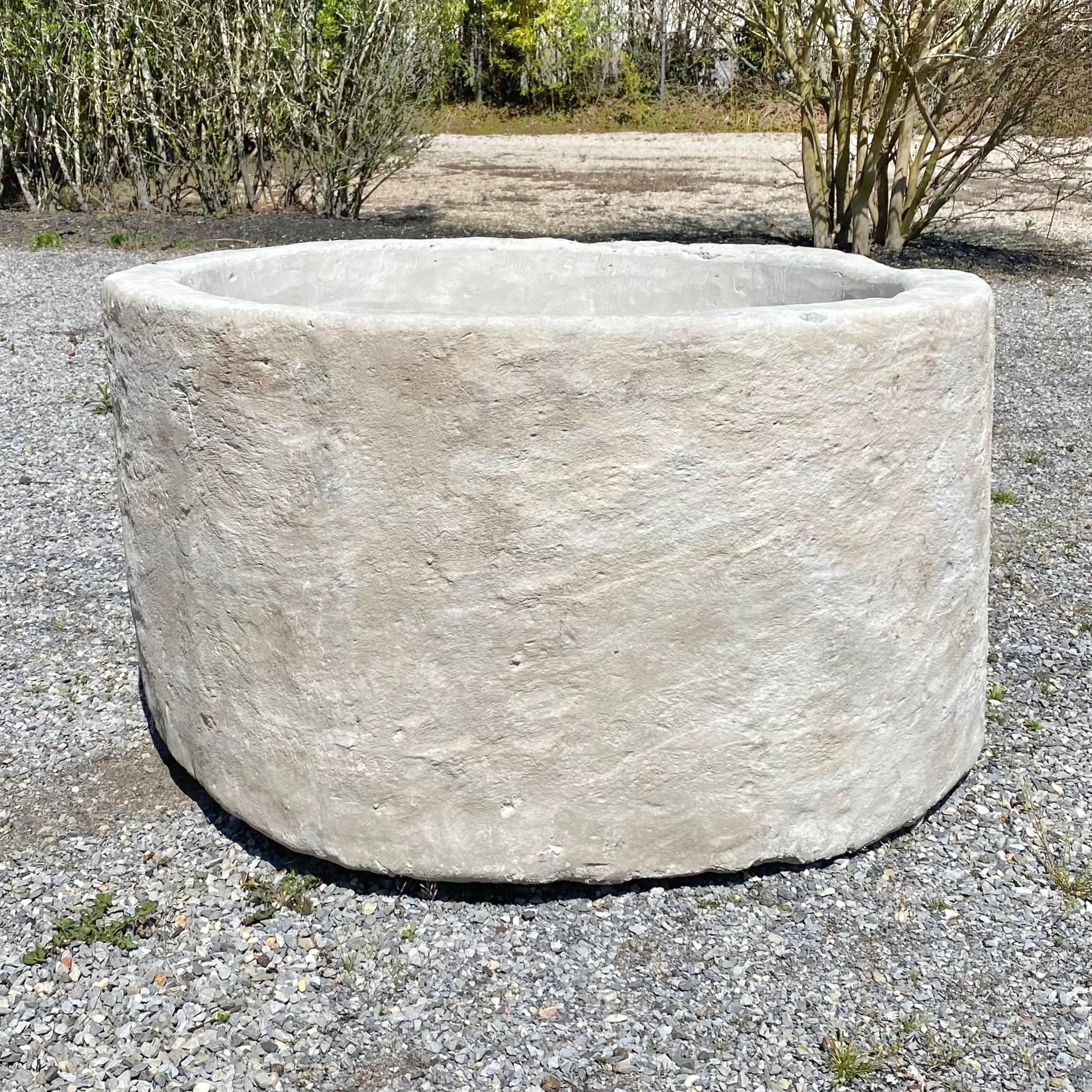 Compliment the natural beauty of your garden or patio with this gorgeous limestone planter, a true statement piece of artisan craftsmanship. Expertly hand-carved from durable, weather-resistant limestone, this planter boasts a rugged texture and a