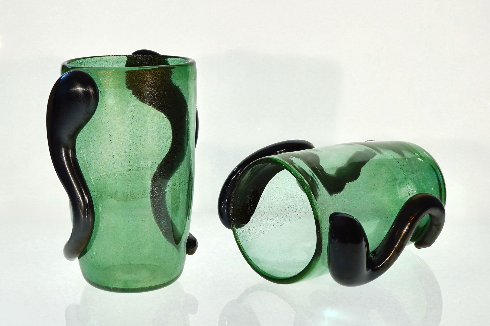 I Colossi, Two Black Beads vase overl gold and emeral green.
The I Colossi is a group of vases made in Murano and currently in production. They are part of the Maestro collection.
The vases are tall, heavy and thick, following mid-century design