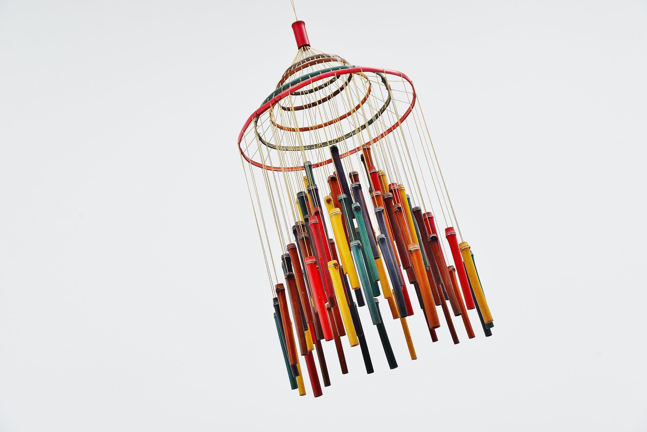 Very nice and decorative colored bamboo mobile sculpture, made in Holland, 1960. This sculpture was made of multicolored bamboo pipes hanging on canvas wires. The mobile makes a nice sound when you walk by and it’s a typical thing that was really