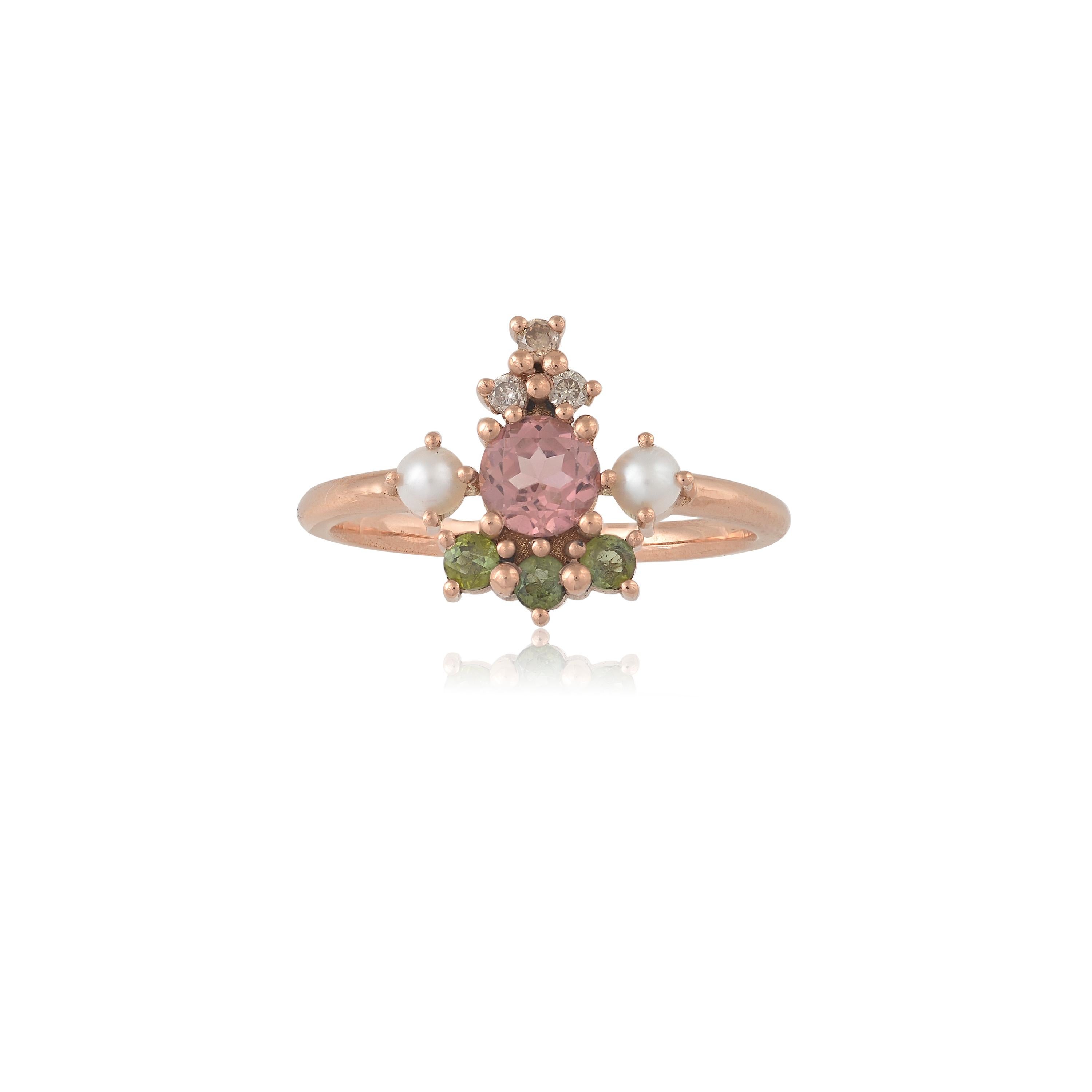 Designer: Alexia Gryllaki
Dimensions: L12x19mm
Ring Size UK K 1/2, US 5 1/2
Weight: approximately 2.8g  
Barcode: OFS041

Multi-stone ring in 18 karat rose gold with a round faceted peach tourmaline approx. 0.34cts, round faceted green tourmalines