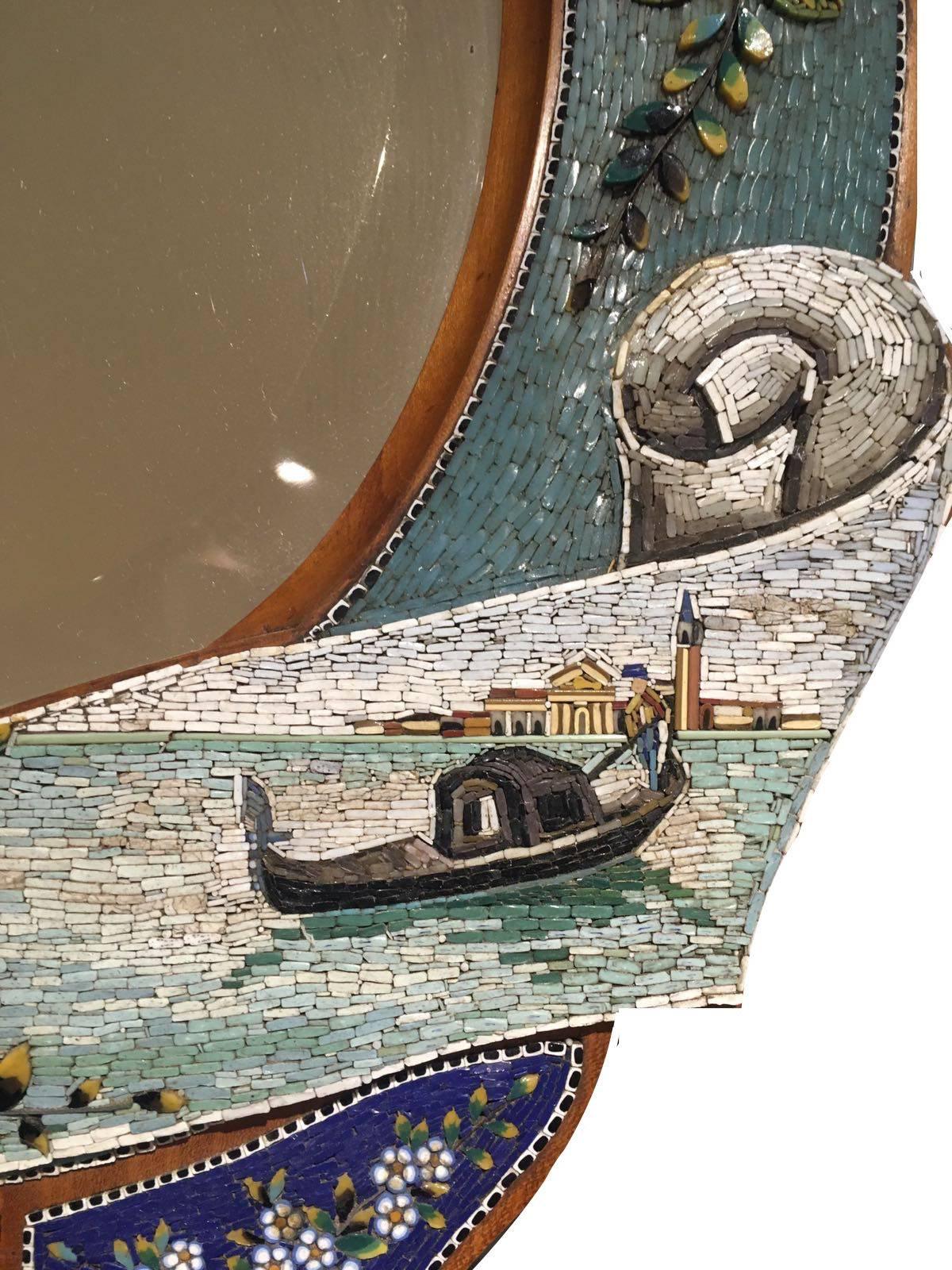 Colourful 19th century, Italian micro-mosaic mirror.

Measure: H 59cm
W 34cm.
