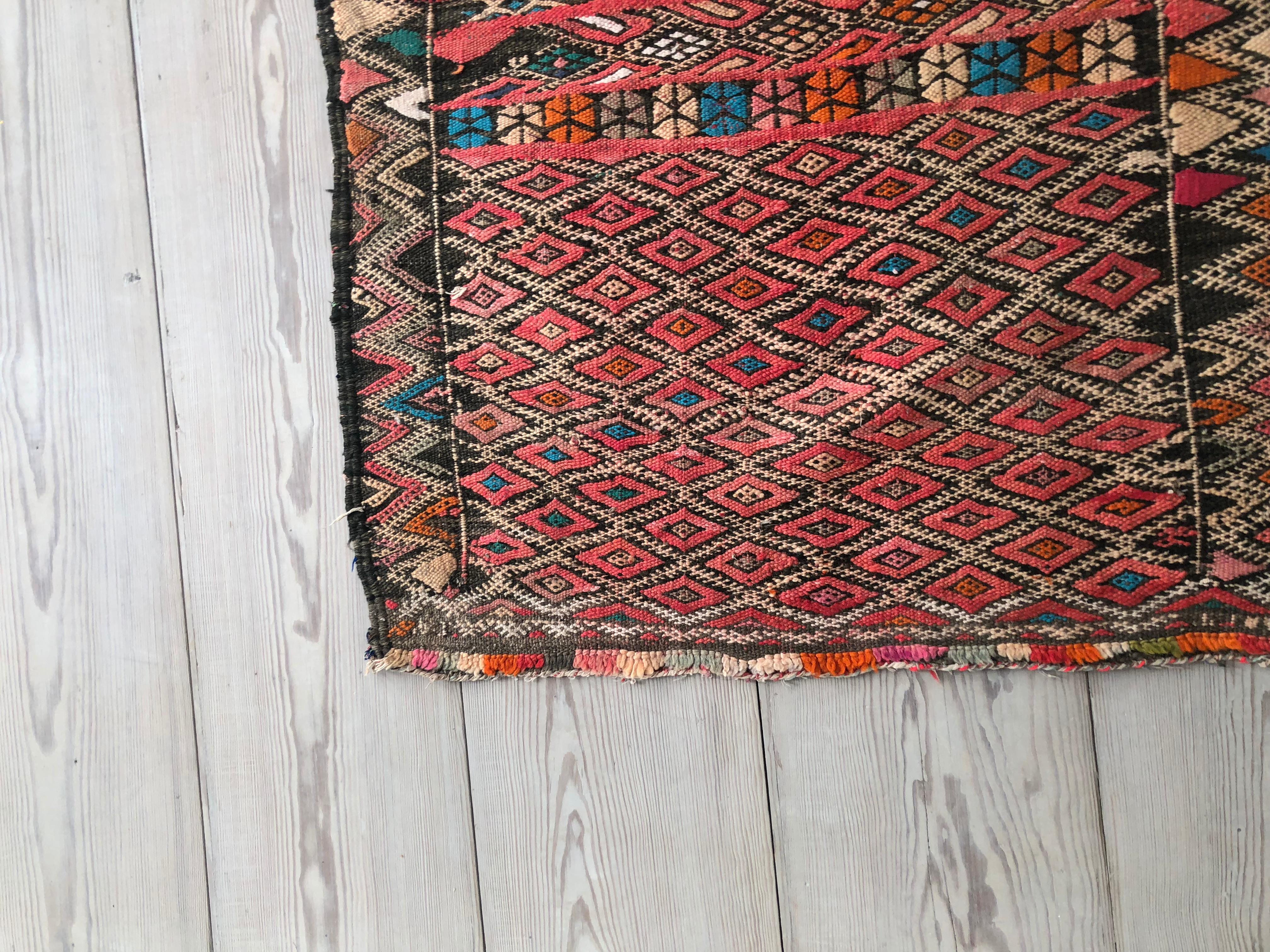 Beautiful kelim runner with a lovely pattern in various colors.