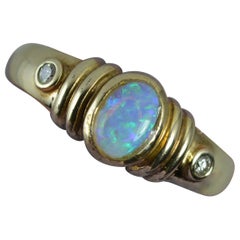 Colourful Opal and Diamond 9 Carat Gold Trilogy Ring